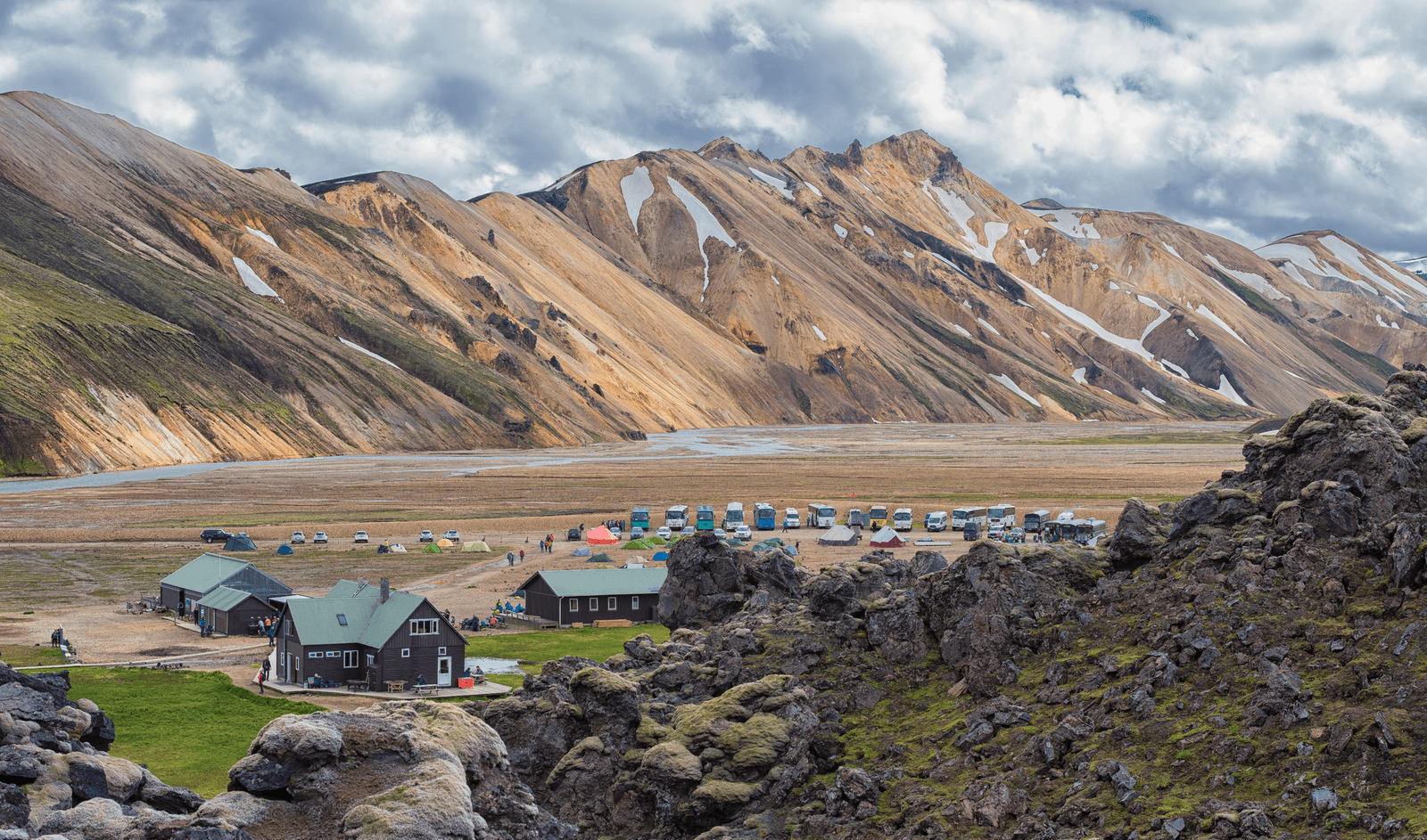 Landmannalaugar huts, lava, and rhyolite mountains in Fjallabak Nature Reserve.