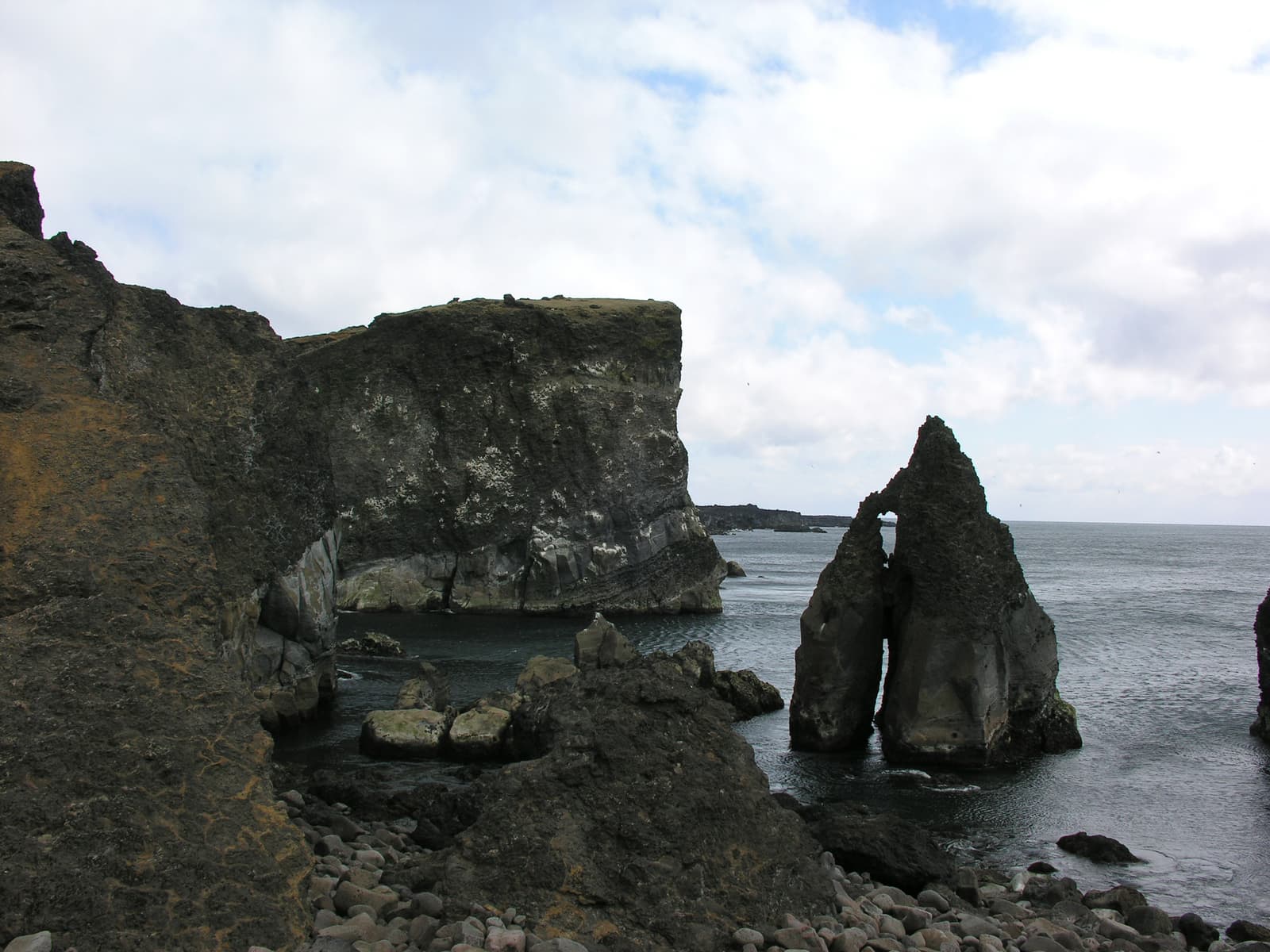 Dark coastal rock stacks in the Hafnir and southwest Reykjanes area.