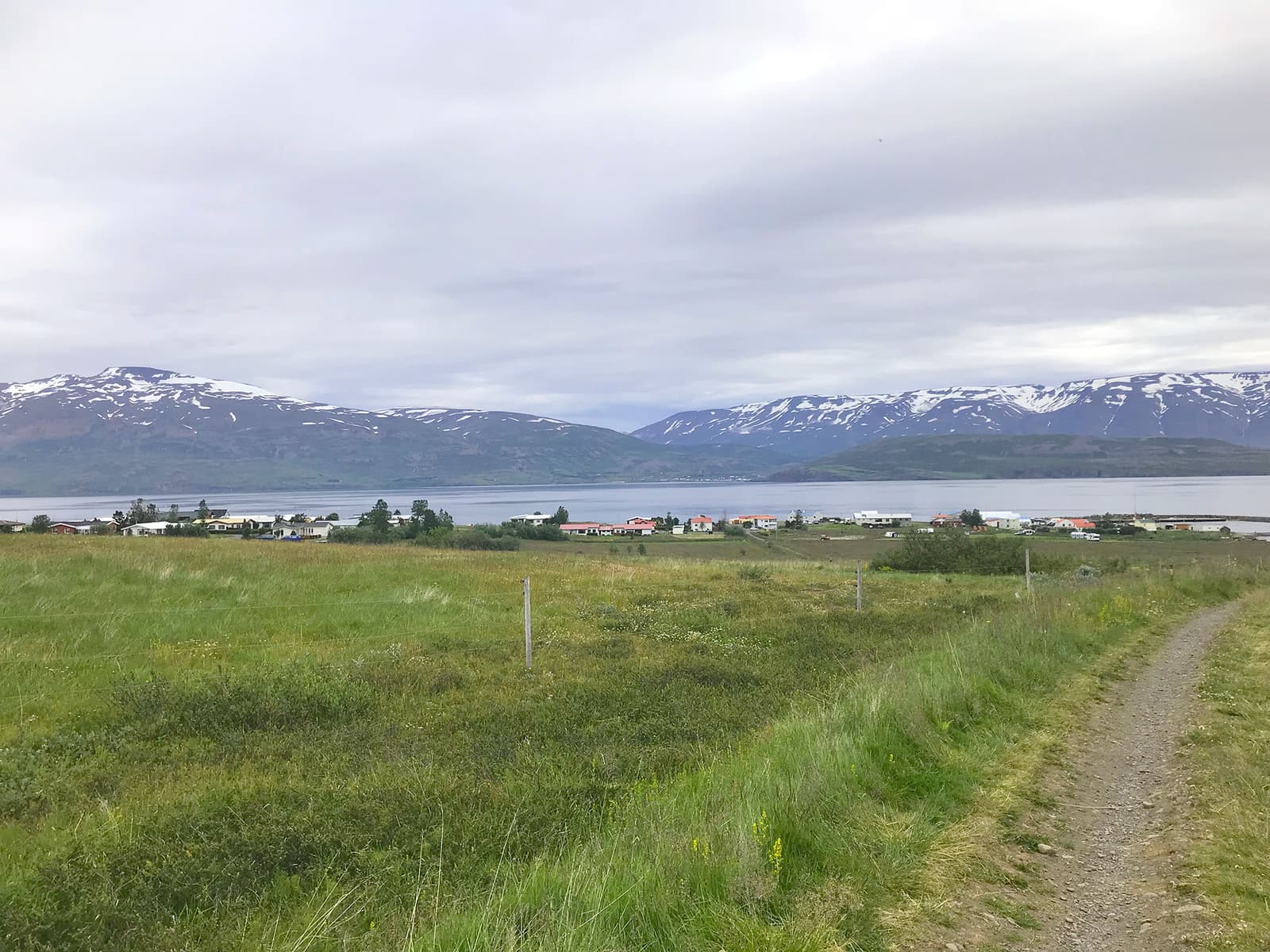 View over Hauganes and Eyjafjörður from the hillside path above the village