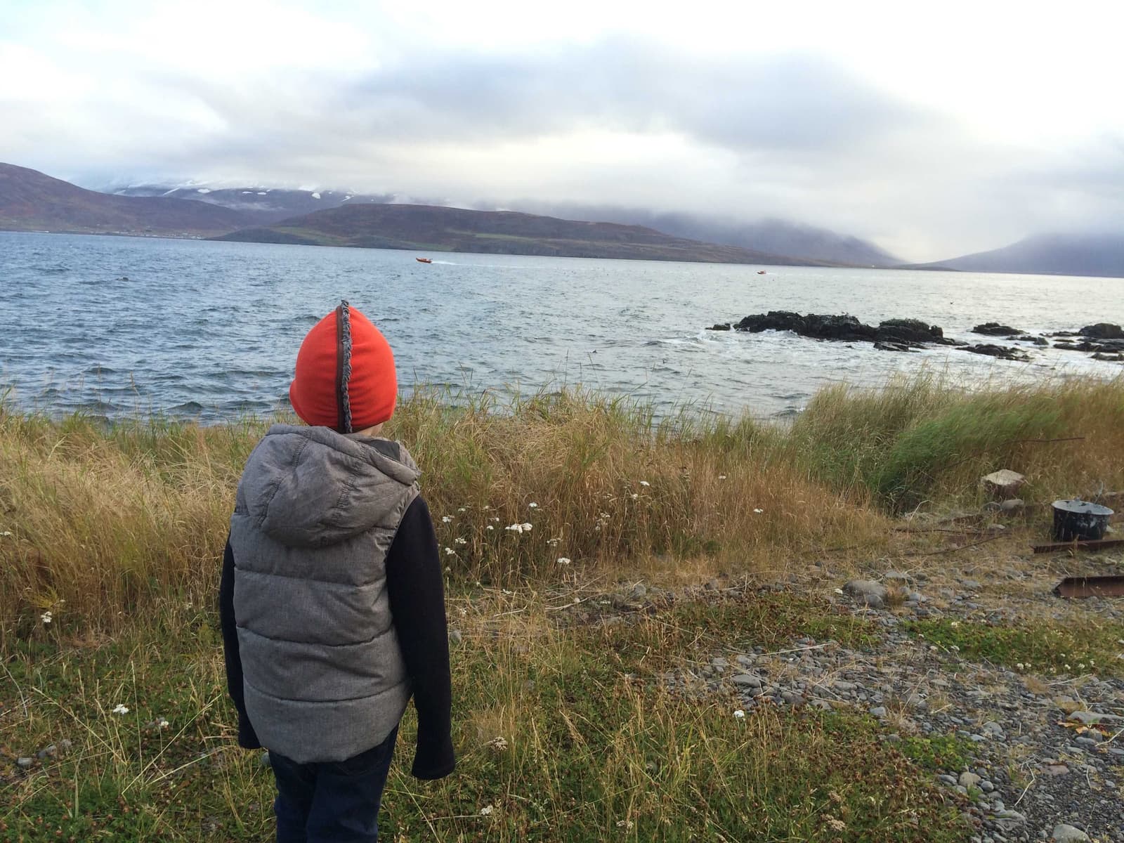 Shoreline view from Hauganes looking out over Eyjafjörður under low cloud