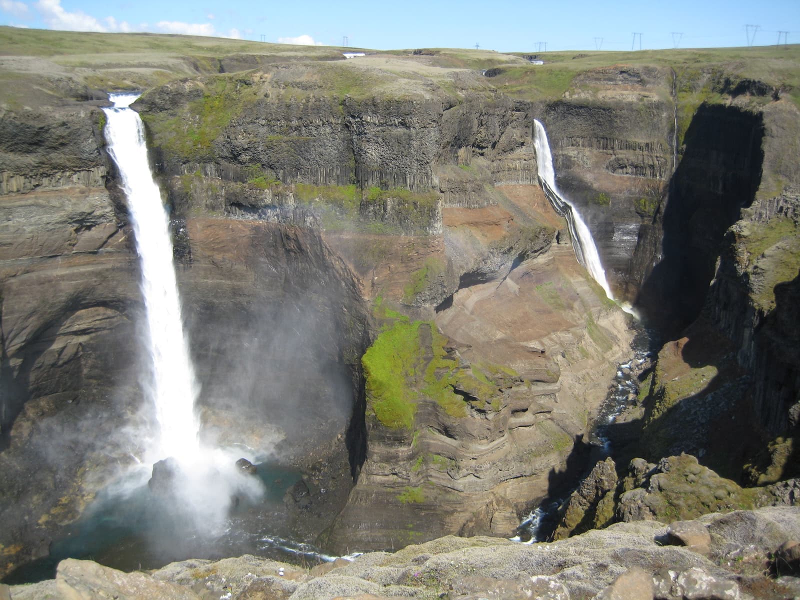 Háifoss and Granni waterfalls dropping into a deep canyon in Þjórsárdalur.