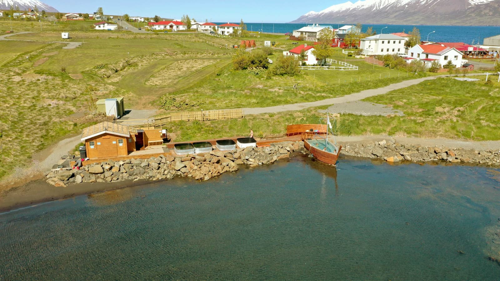 Hauganes beach baths and village setting on Eyjafjörður in North Iceland.