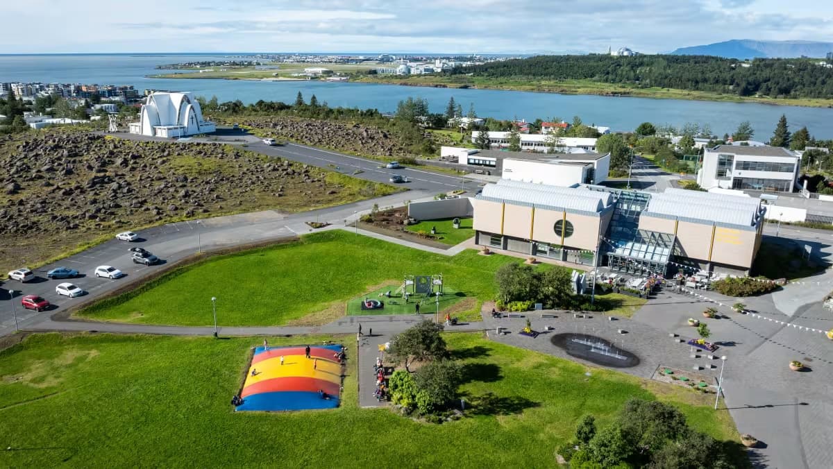 Kópavogur Culture Hill with Kópavogskirkja, cultural buildings, and the bay beyond.