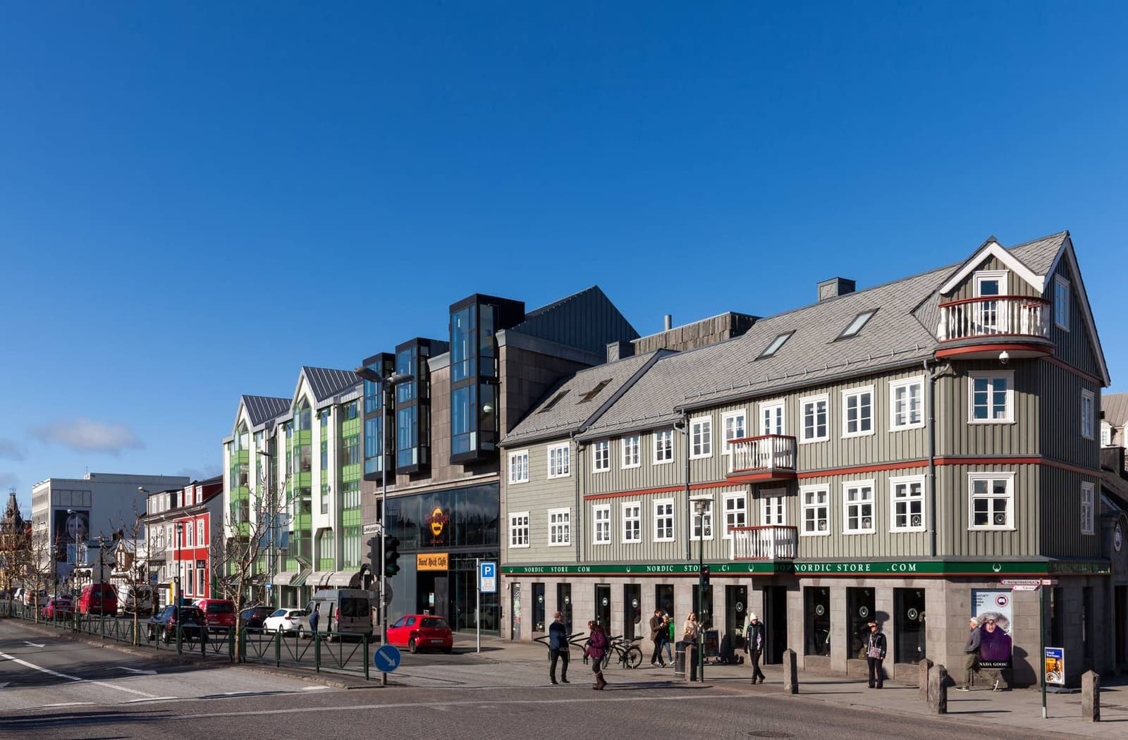 Old timber houses and newer buildings along Lækjargata in central Reykjavík.
