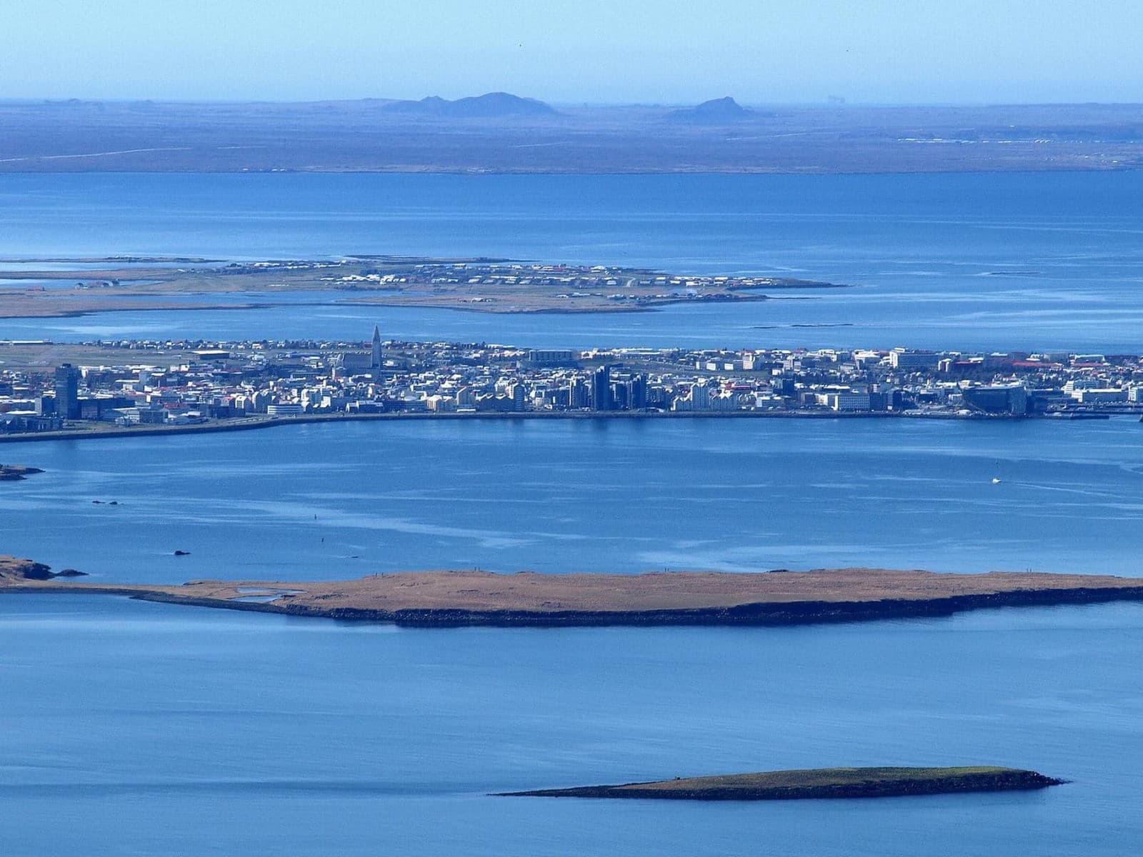 Lundey island in Kollafjörður with Reykjavík and Faxaflói bay behind it.