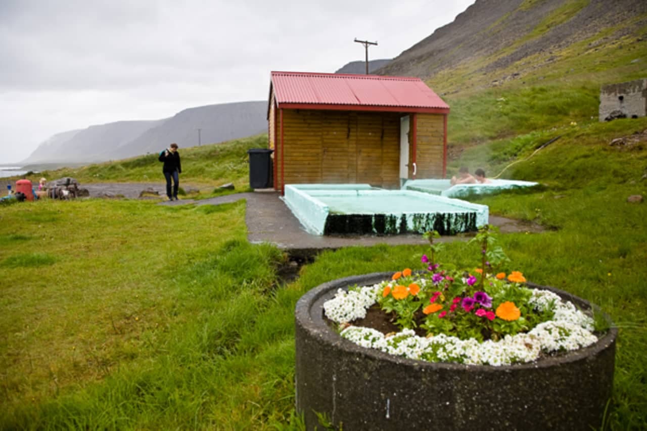 Pollurinn hot pools and hillside view near Tálknafjörður.