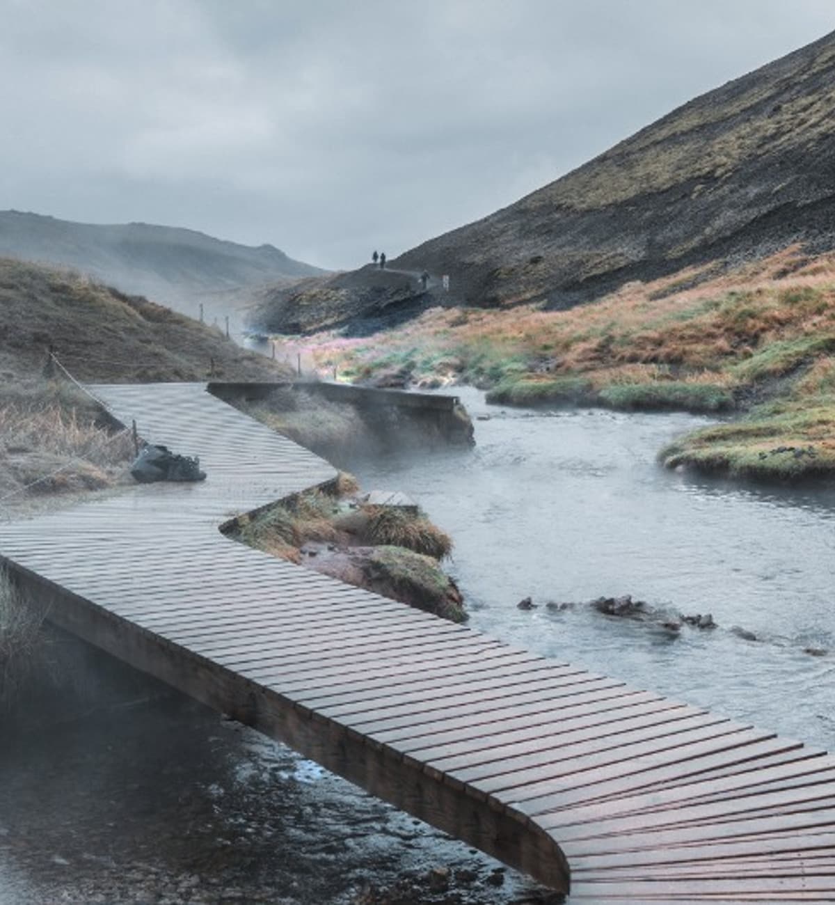 Boardwalk beside the steaming warm river in Reykjadalur valley near Hveragerði.