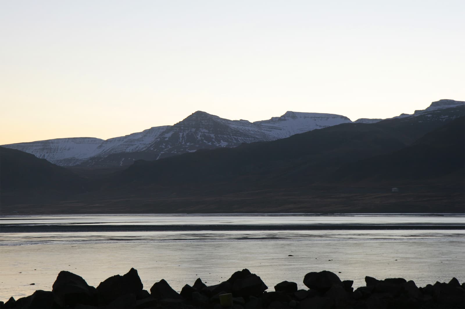 Skarðsheiði seen from Borgarnes across low West Iceland landscape.