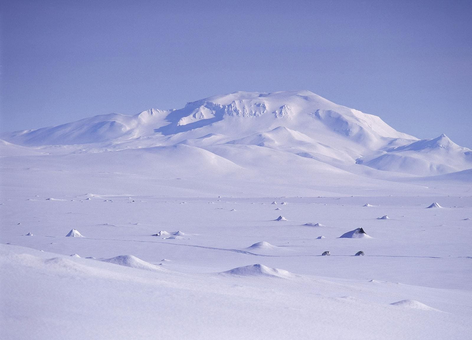Snow-covered Snæfell mountain rising above the East Iceland highlands.