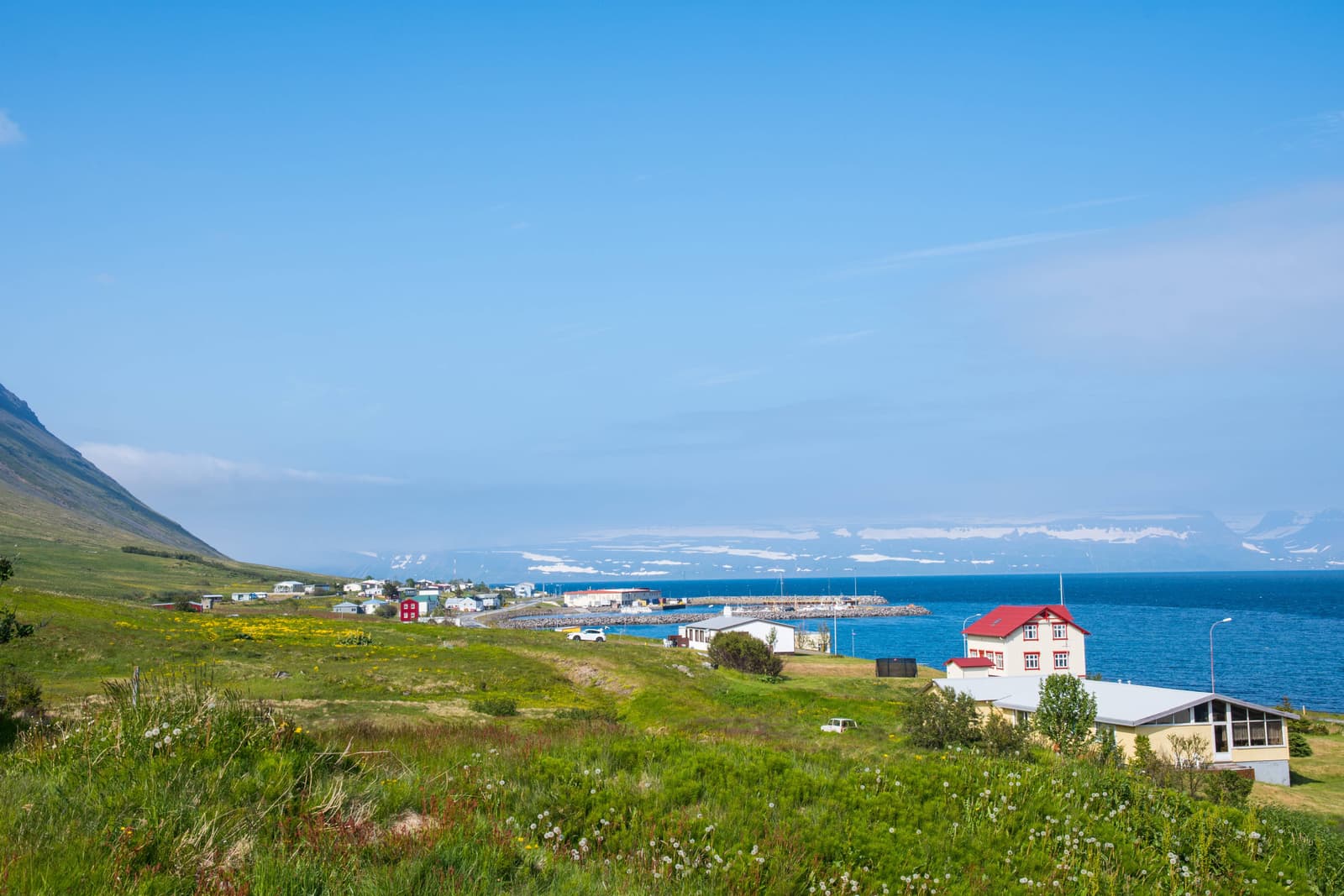 Súðavík village, harbor, and fjord setting in the Westfjords.