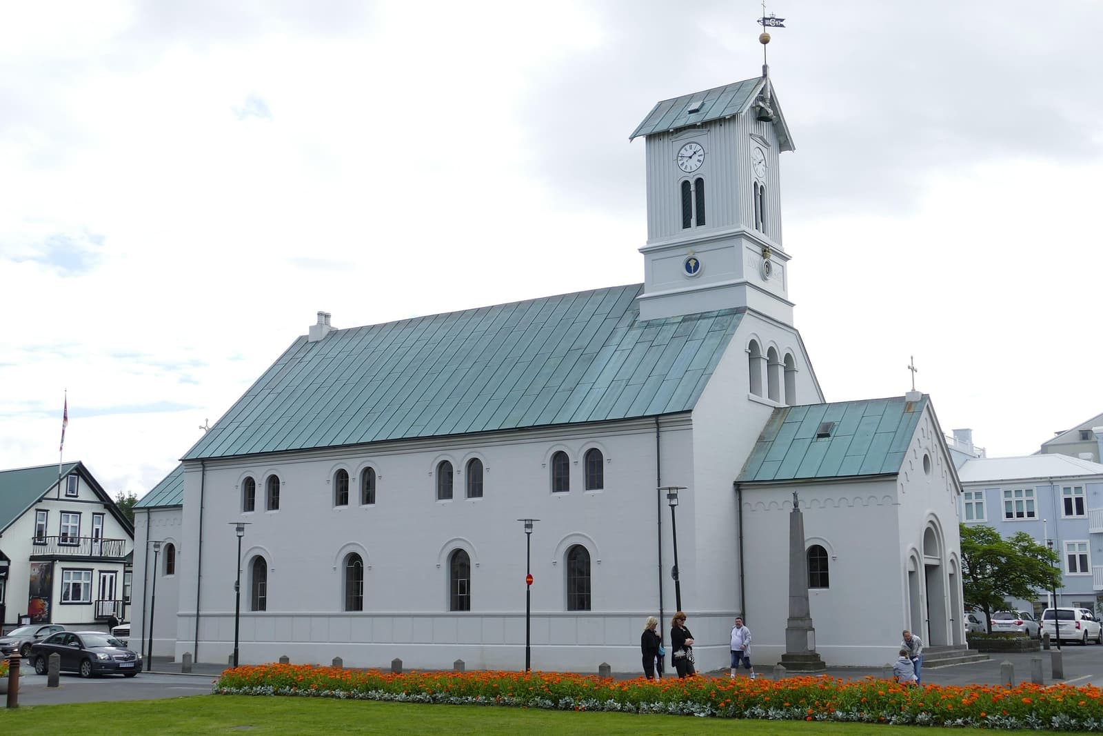 Dómkirkjan white cathedral and clock tower beside Austurvöllur in central Reykjavík