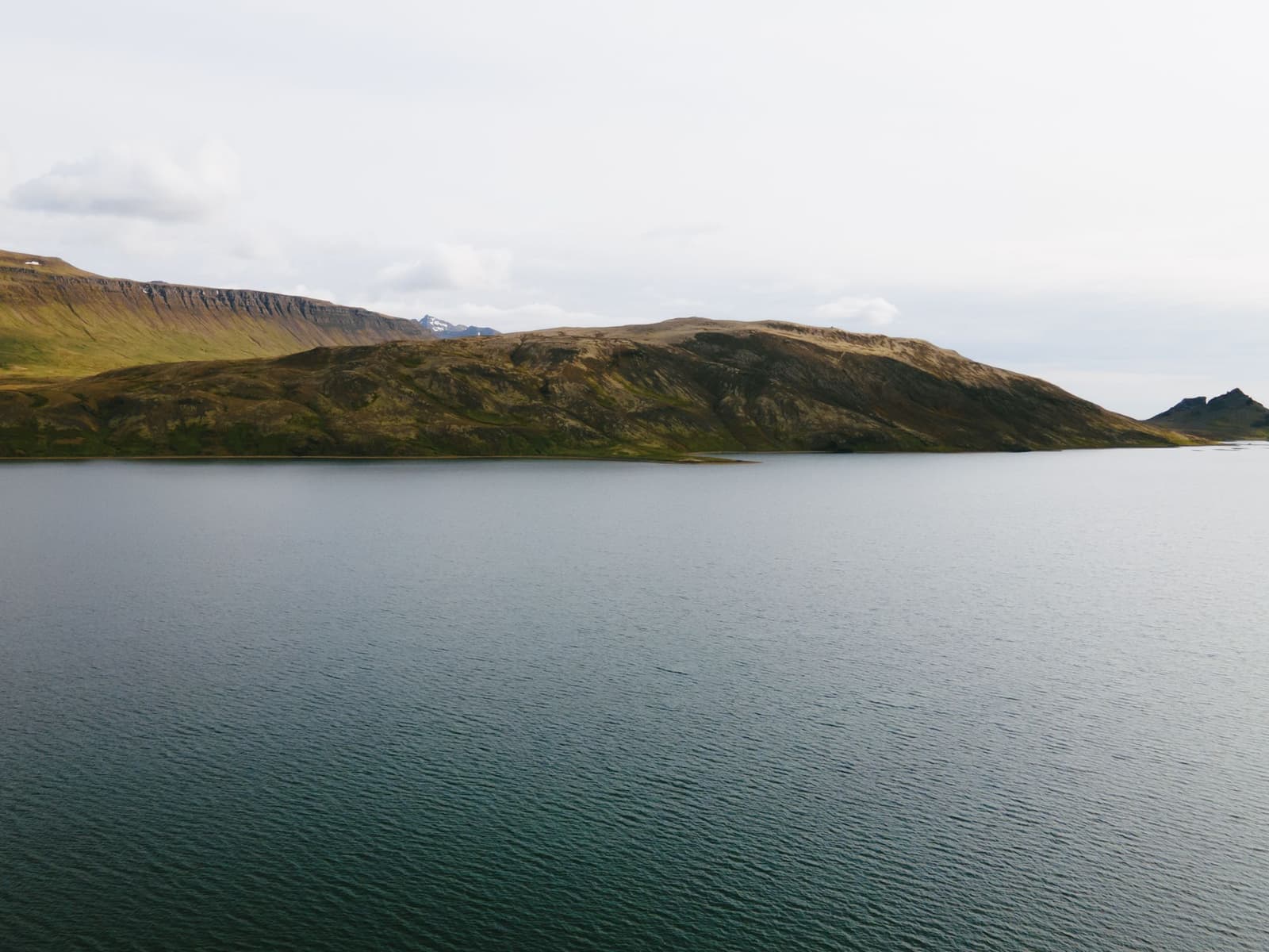 Hlíðarvatn lake below Hnappadalur mountains in West Iceland.