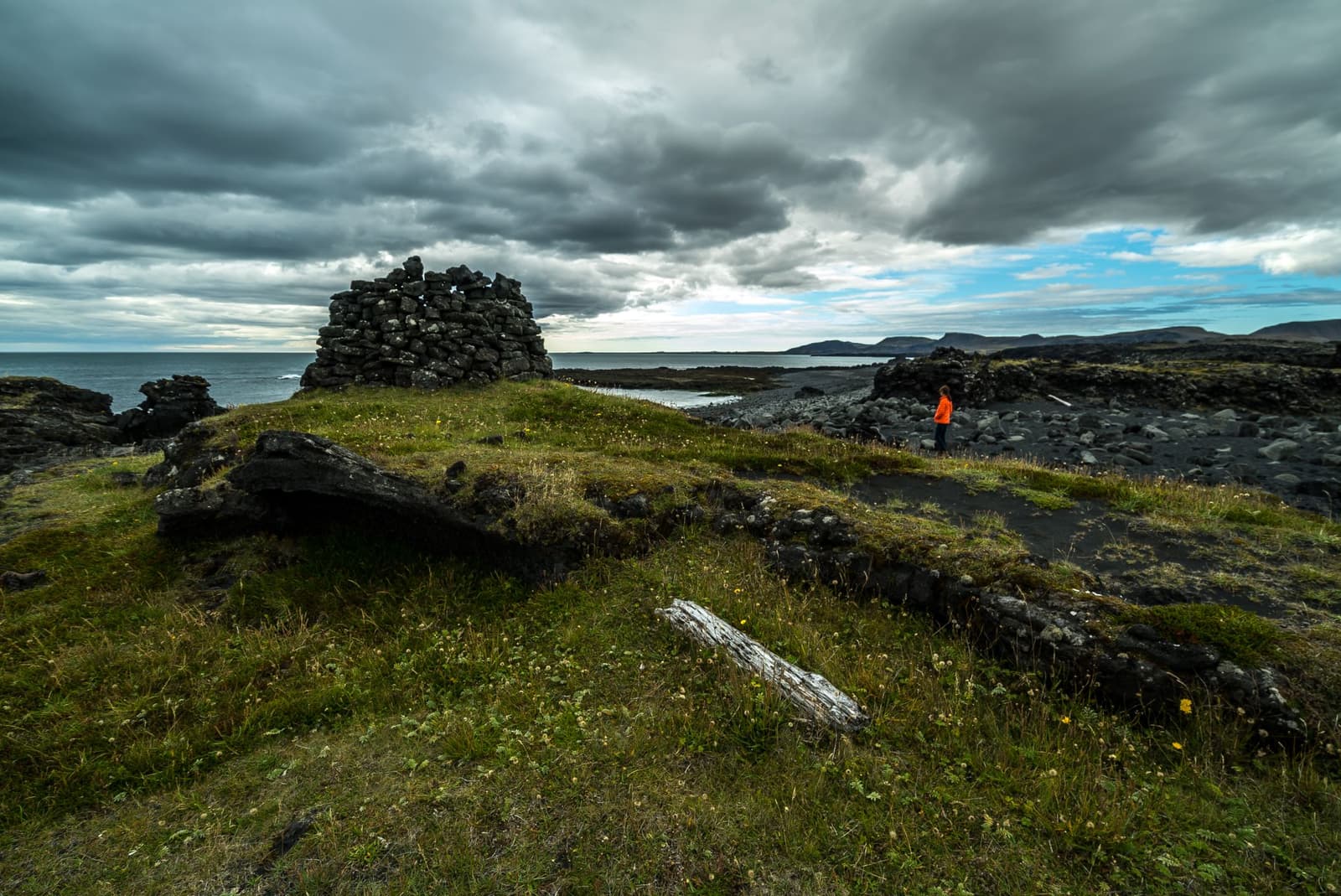 Old lava-stone ruins at Selatangar above the rough Reykjanes coast.