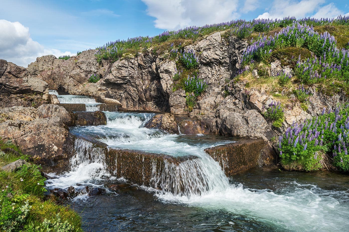 Beljandi Waterfall and Breiðdalsá below East Iceland mountains.