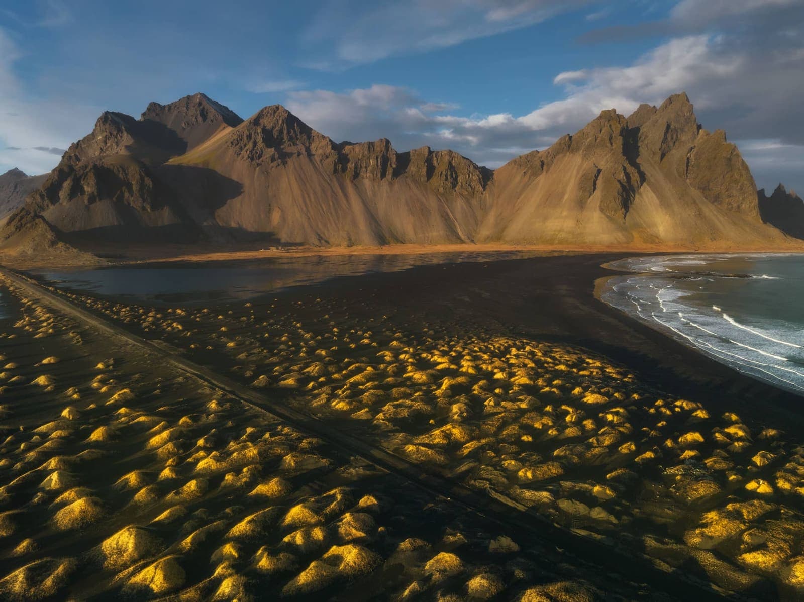 Open road and broad South Coast landscape on a focused Iceland itinerary route