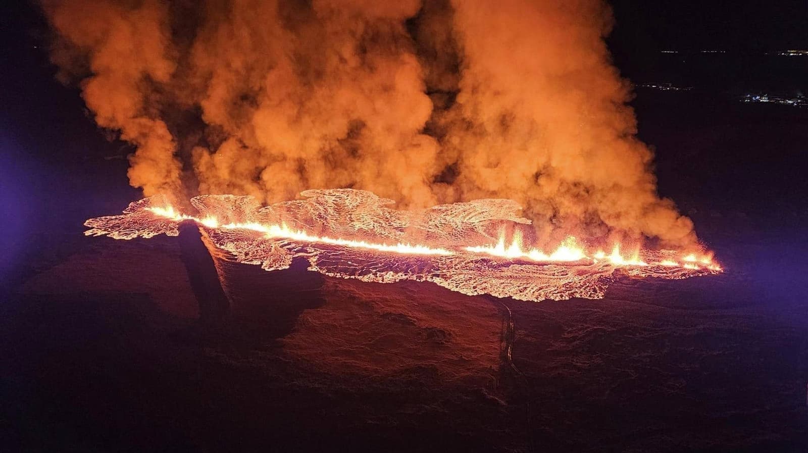Volcanic fissure and protective barrier near Hagafell by Grindavik on the Reykjanes Peninsula.