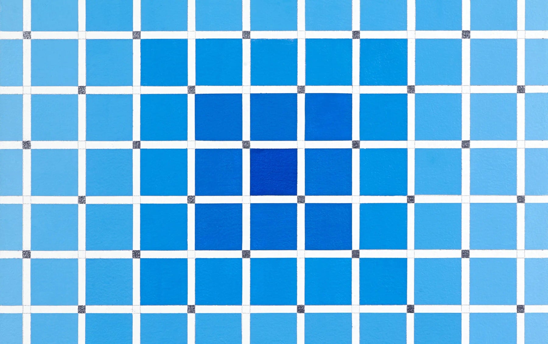 A blue grid artwork shown in Hafnarborg exhibition imagery.