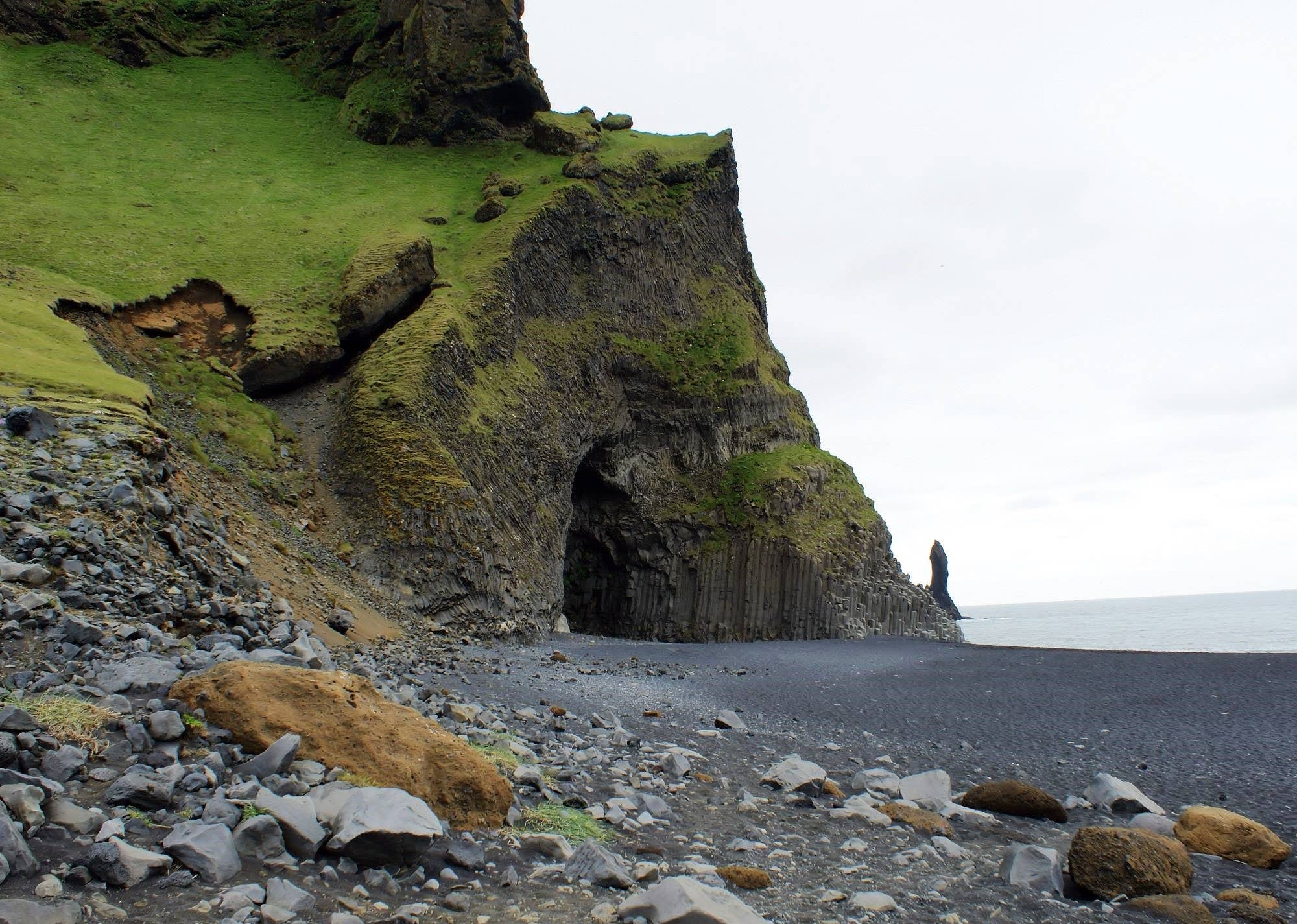 Basalt columns framing Halsanefshellir Cave at Reynisfjara black sand beach