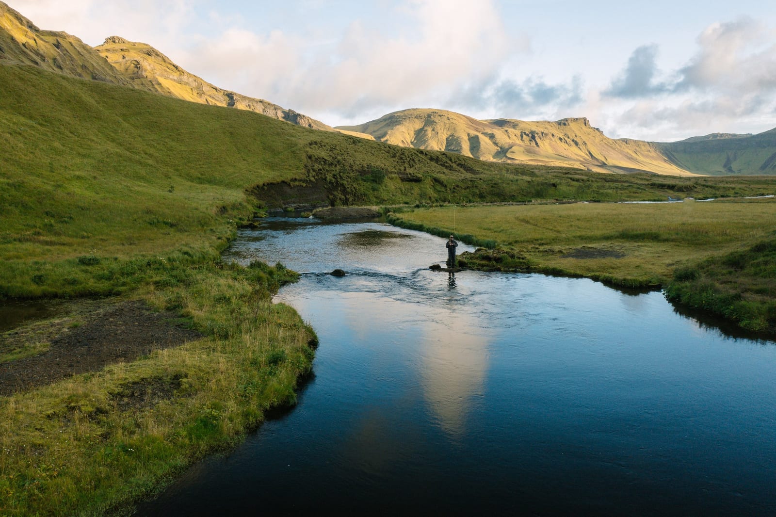 Lake Heiðarvatn and the green Heiðardalur valley north of Vík.