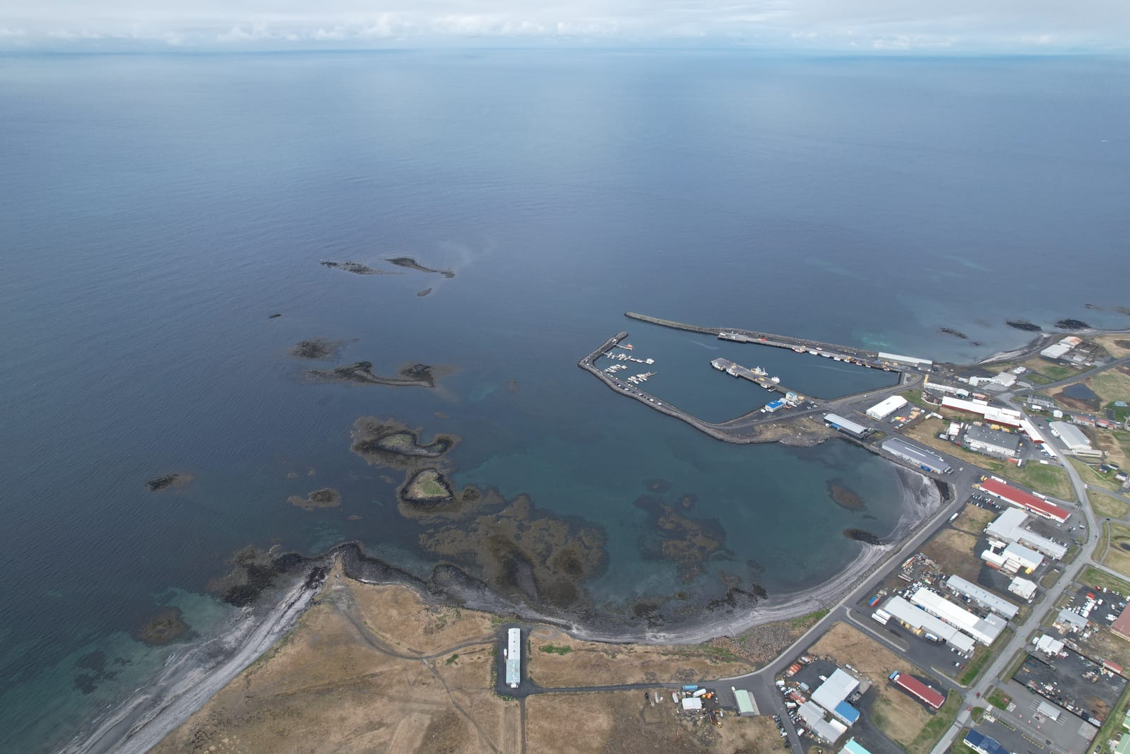 Sandgerðishöfn harbor and the surrounding town of Sandgerði on the Reykjanes coast.