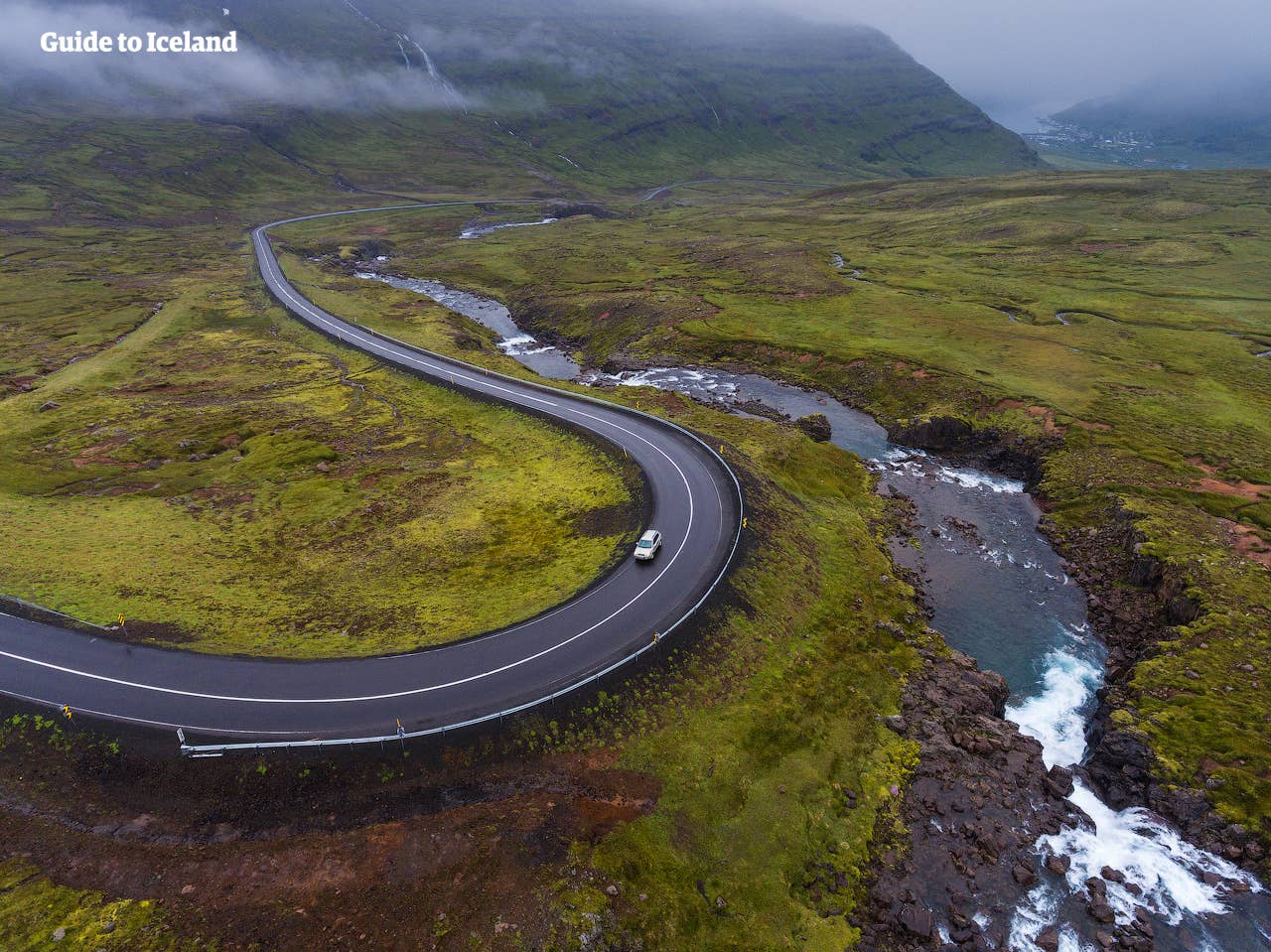 The road into Seyðisfjörður, which travelers use before adding the Technical Museum of East Iceland to the day.