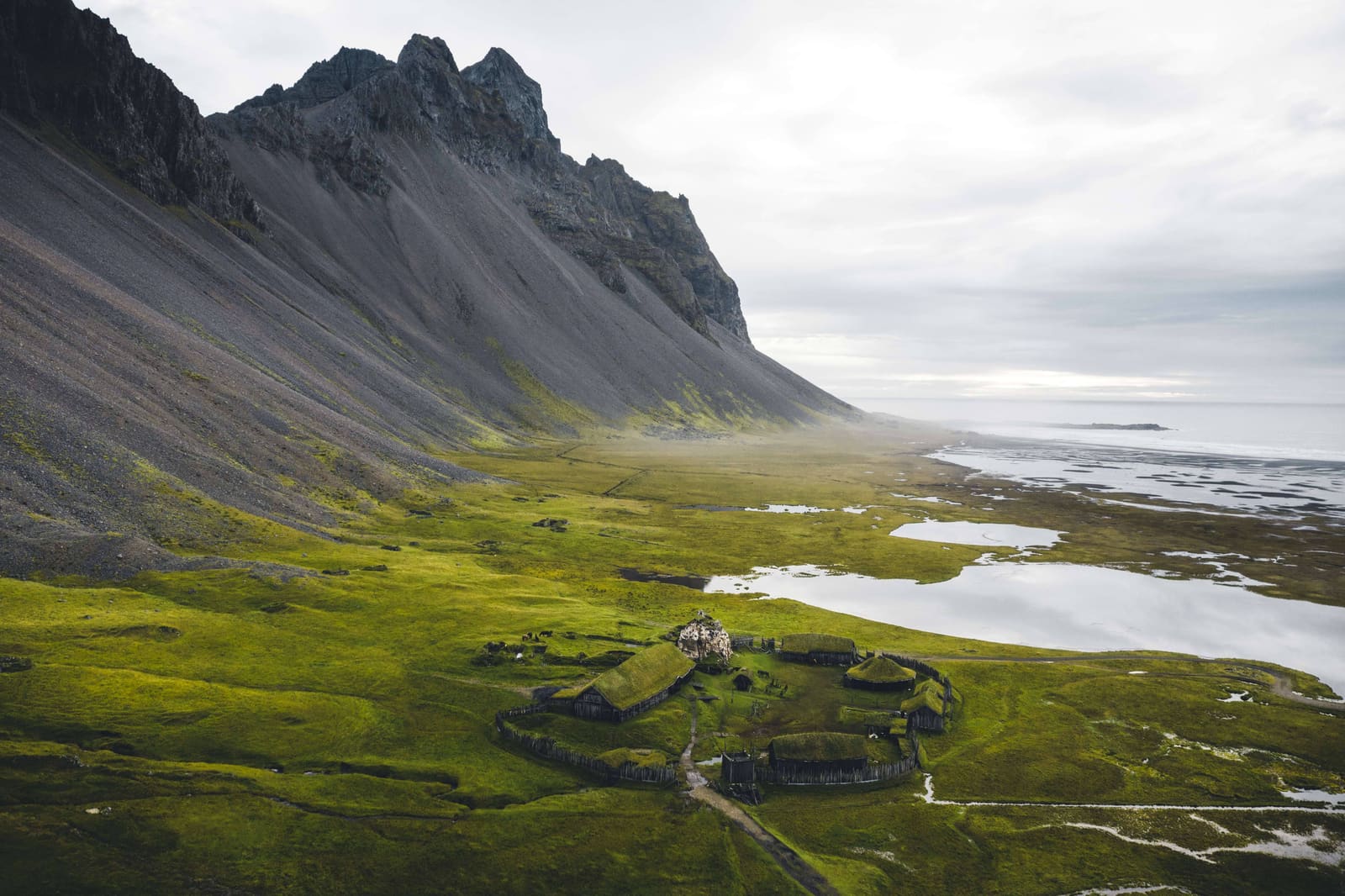 Aerial view of the Viking Village Film Set below Vestrahorn on the Stokksnes Peninsula
