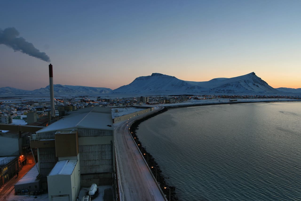 Akrafjall mountain rising behind Akranes and the winter coastline in West Iceland.