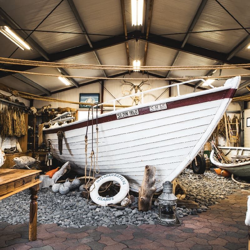 A fishing boat display inside the Bjarnarhöfn Shark Museum.