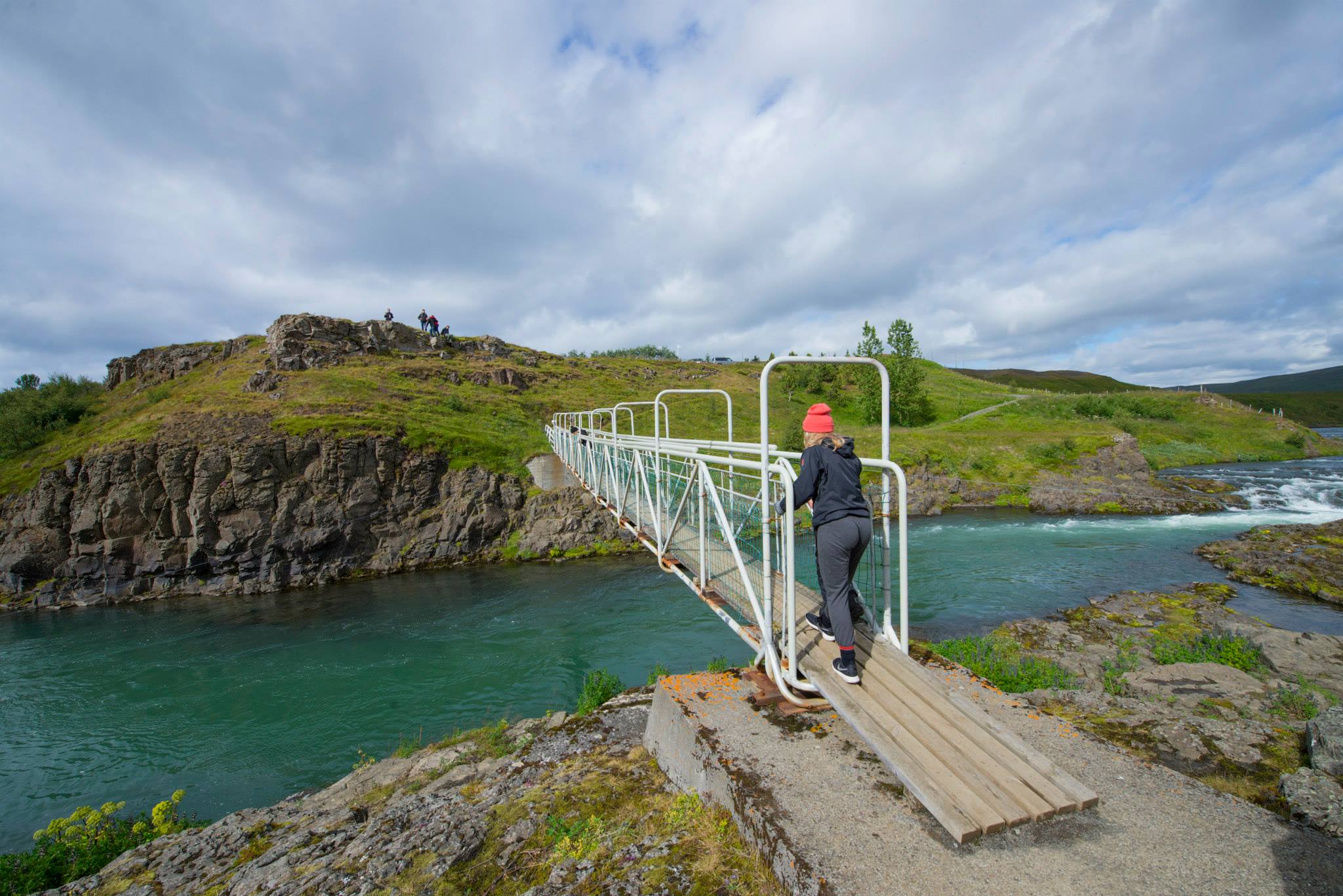 Pedestrian bridge crossing the Blanda river to Hrútey island in Blönduós.