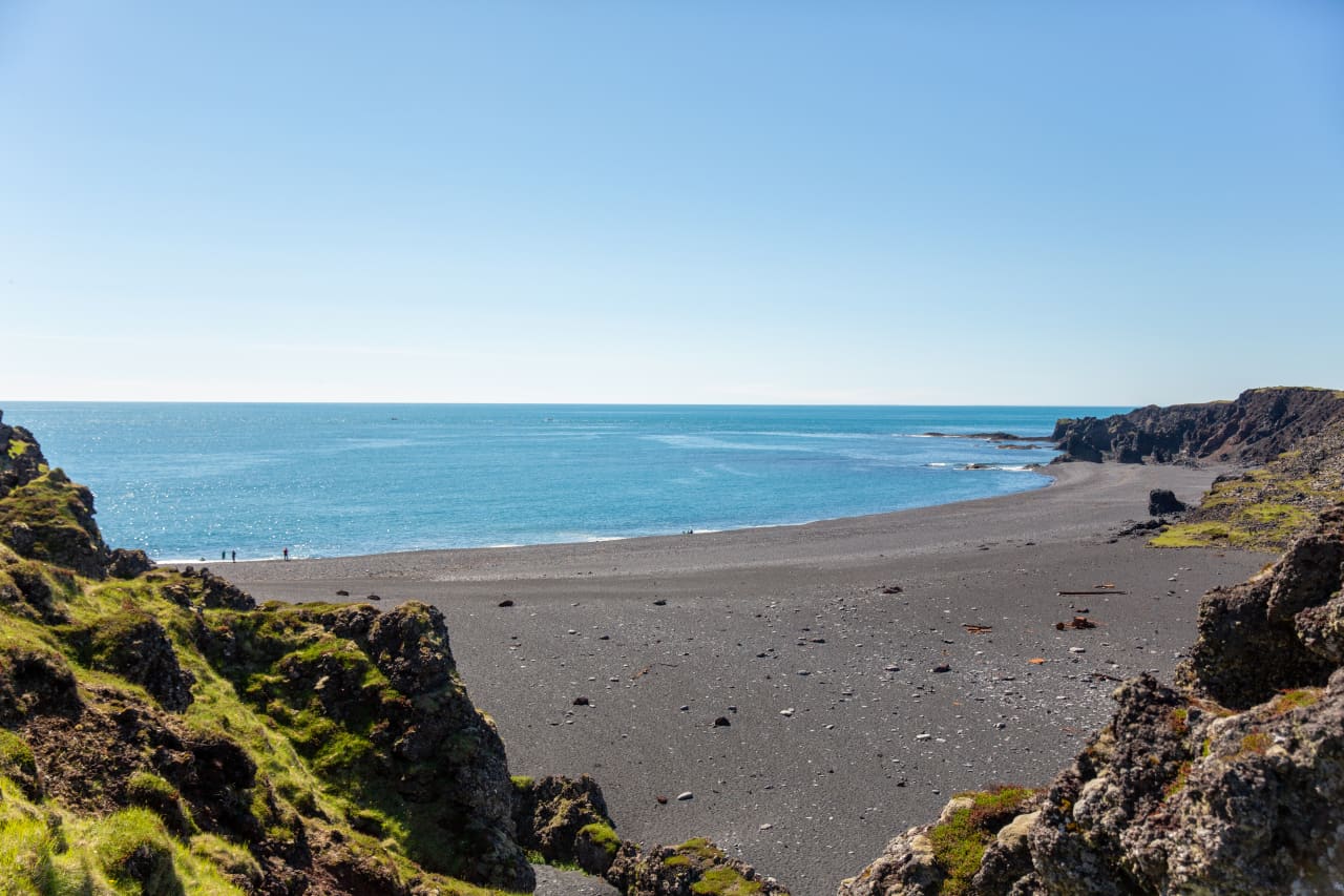 Djúpalónssandur black beach seen from lava rocks above the shore on the Snæfellsnes coast.