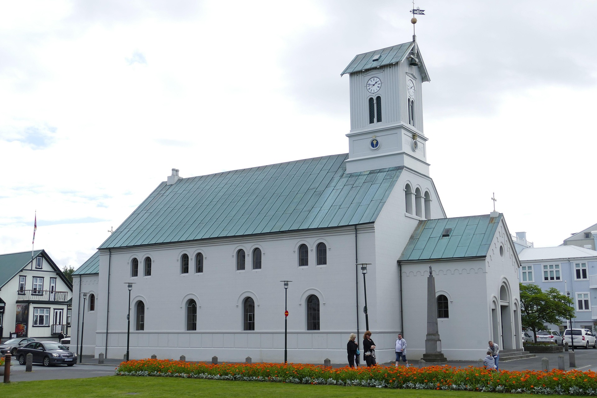 Dómkirkjan white cathedral and clock tower beside Austurvöllur in central Reykjavík