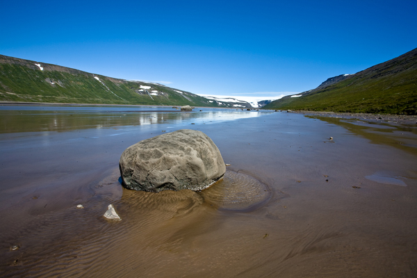 Kaldalón fjord with a glacier view toward Drangajökull between green Westfjords slopes.