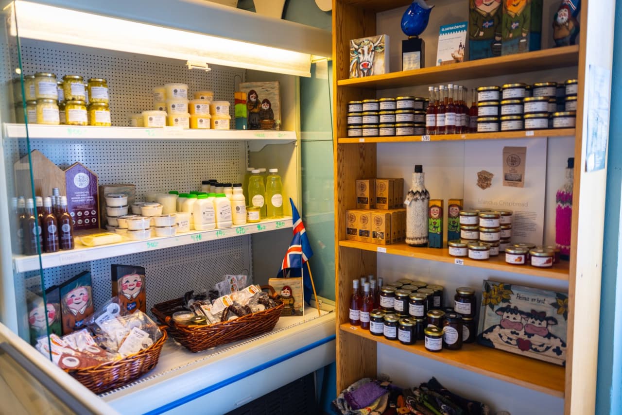 Shelves of dairy products and local goods inside the Erpsstaðir farm shop.