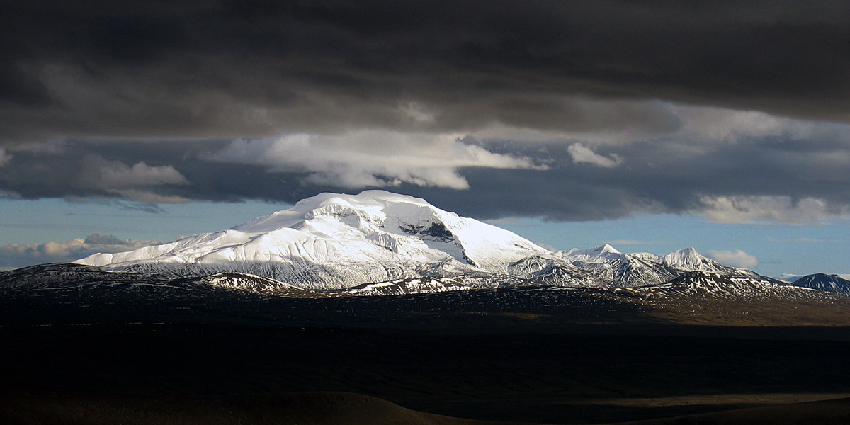 Eyjabakkajökull glacier under dark clouds in the remote East Iceland highlands.