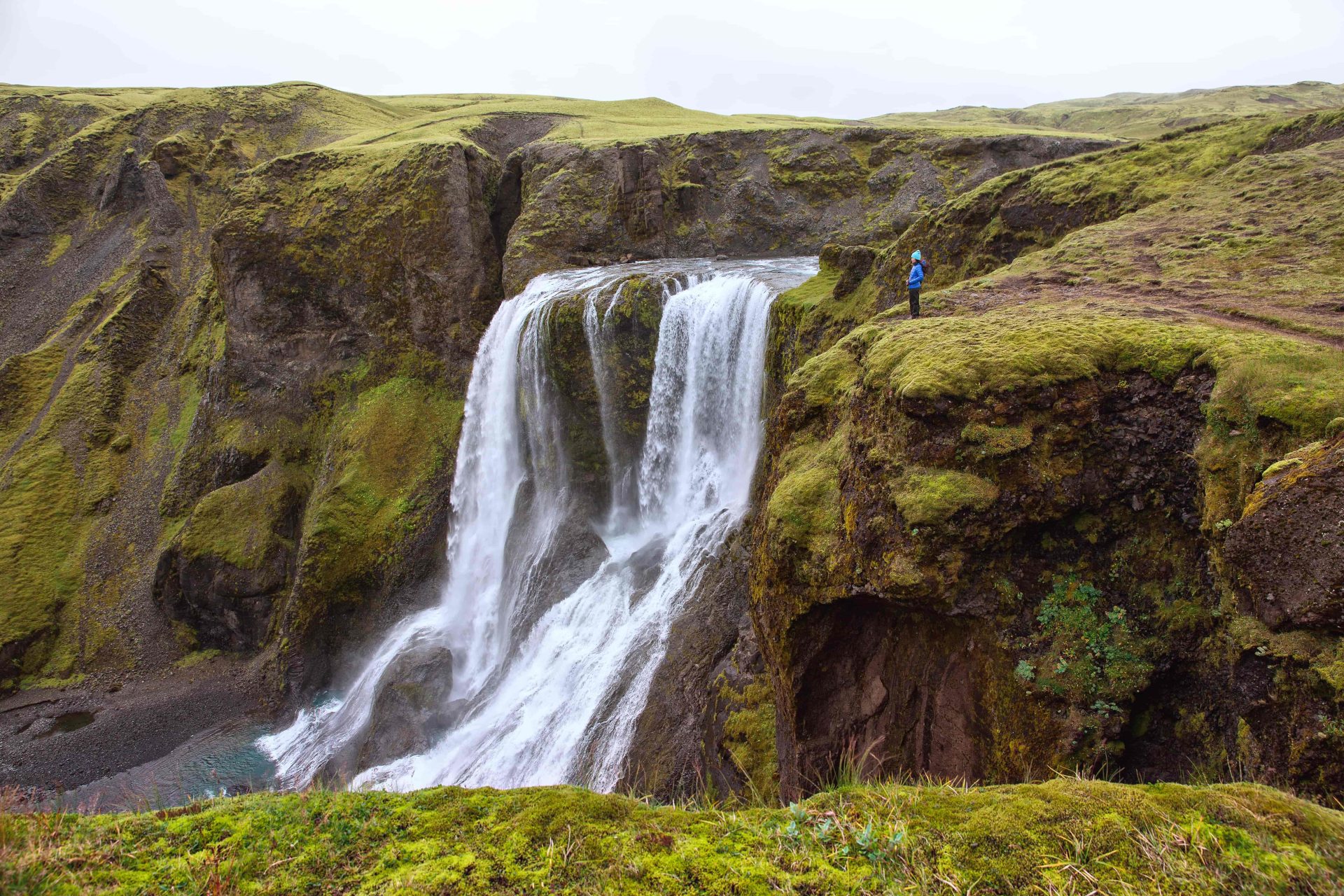 Fagrifoss waterfall dropping into a mossy canyon beside the F206 highland road in South Iceland.