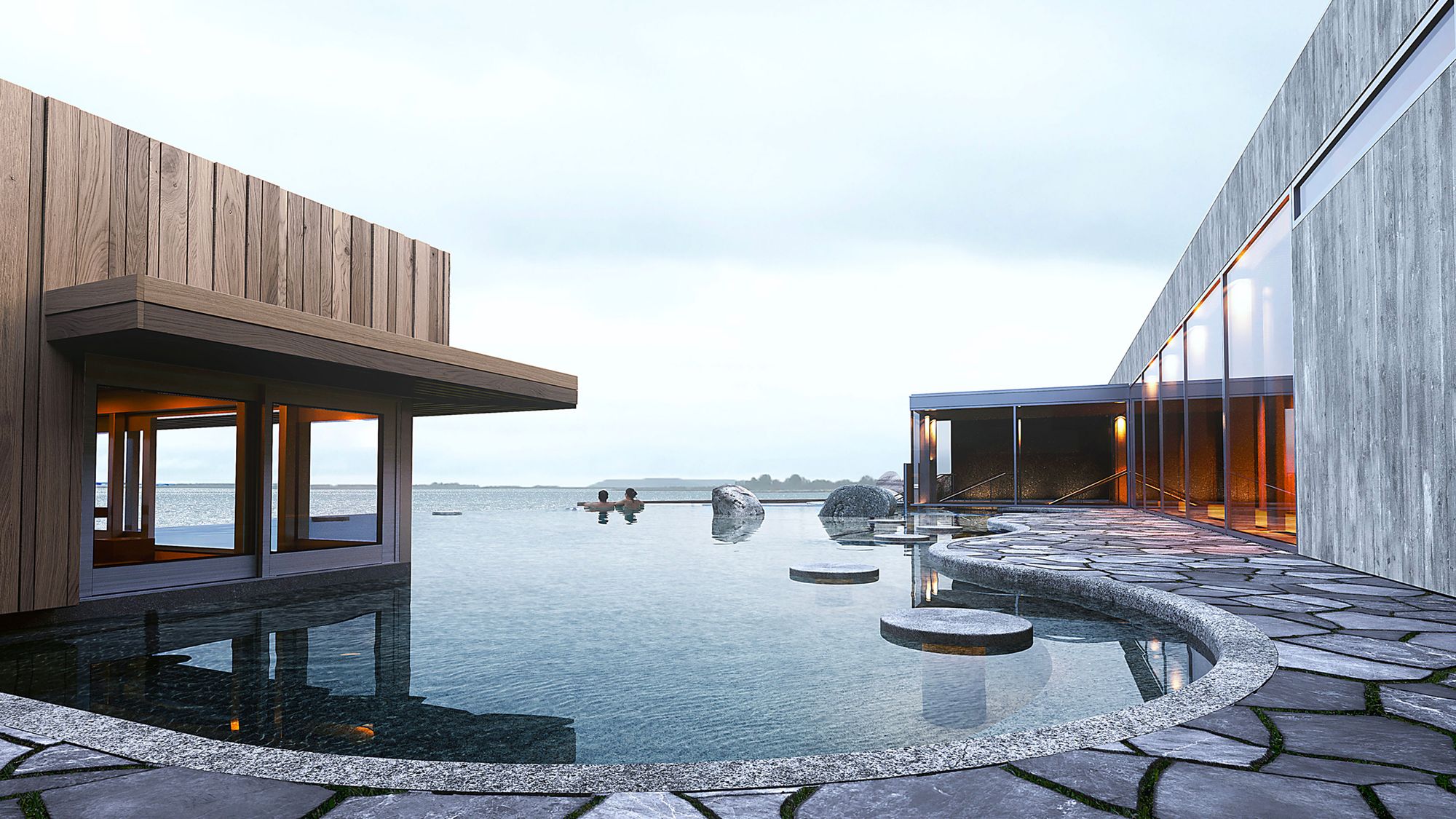 Warm pool at Fontana Spa beside Lake Laugarvatn with bathers and low modern buildings along the water.
