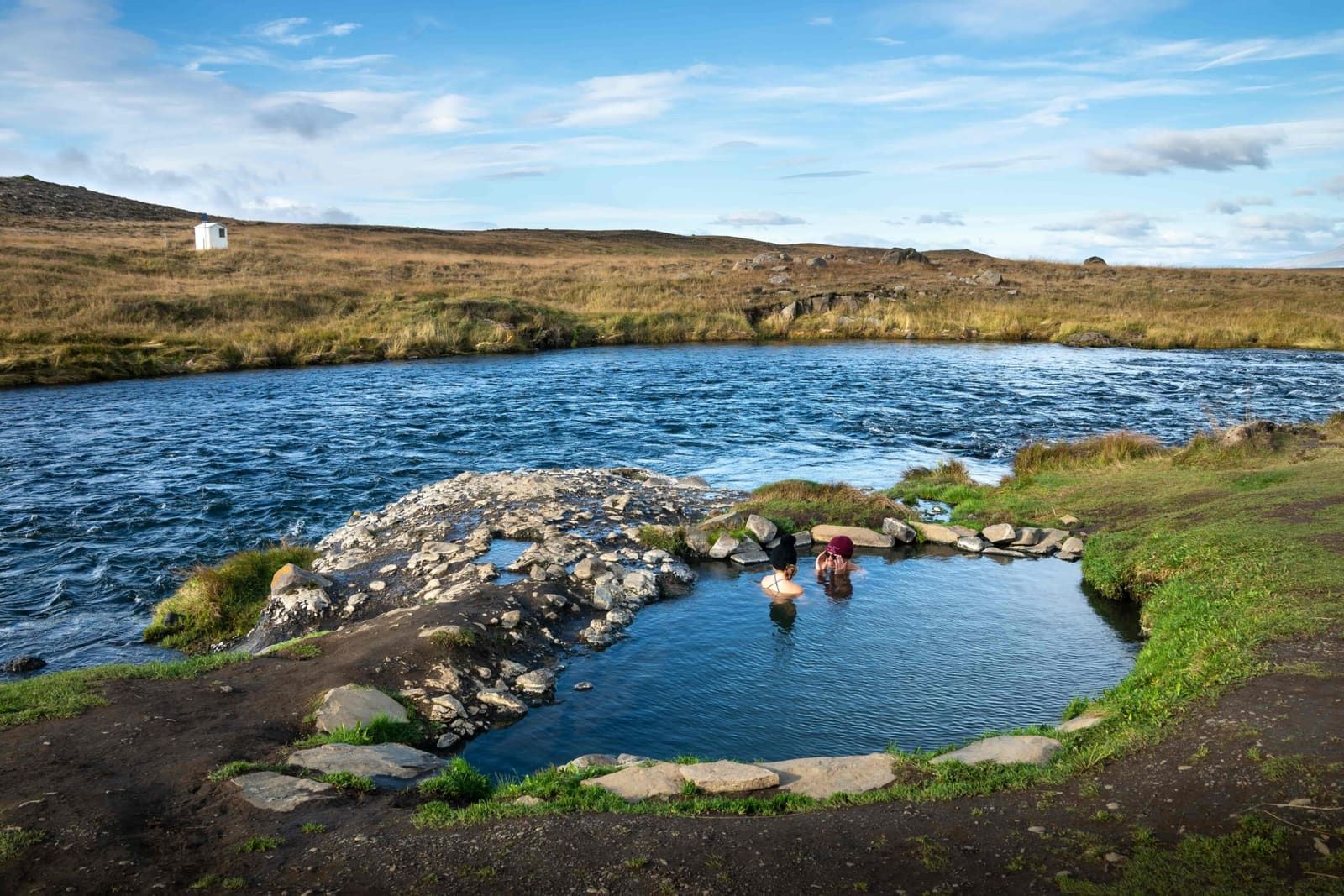 Fosslaug Hot Spring beside the river near Varmahlid in North Iceland.