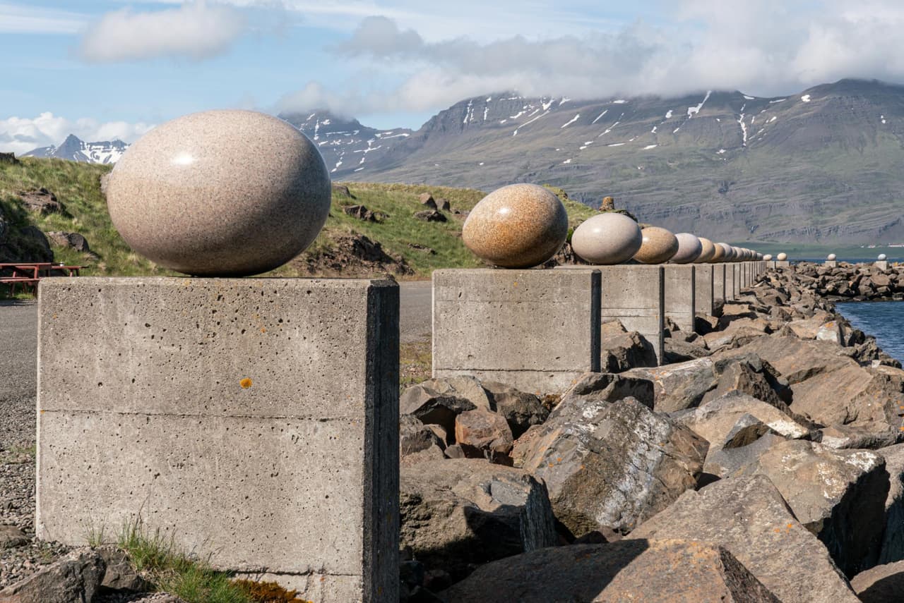 Granite egg sculptures at Eggin í Gleðivík on the shore in Djúpivogur, East Iceland.