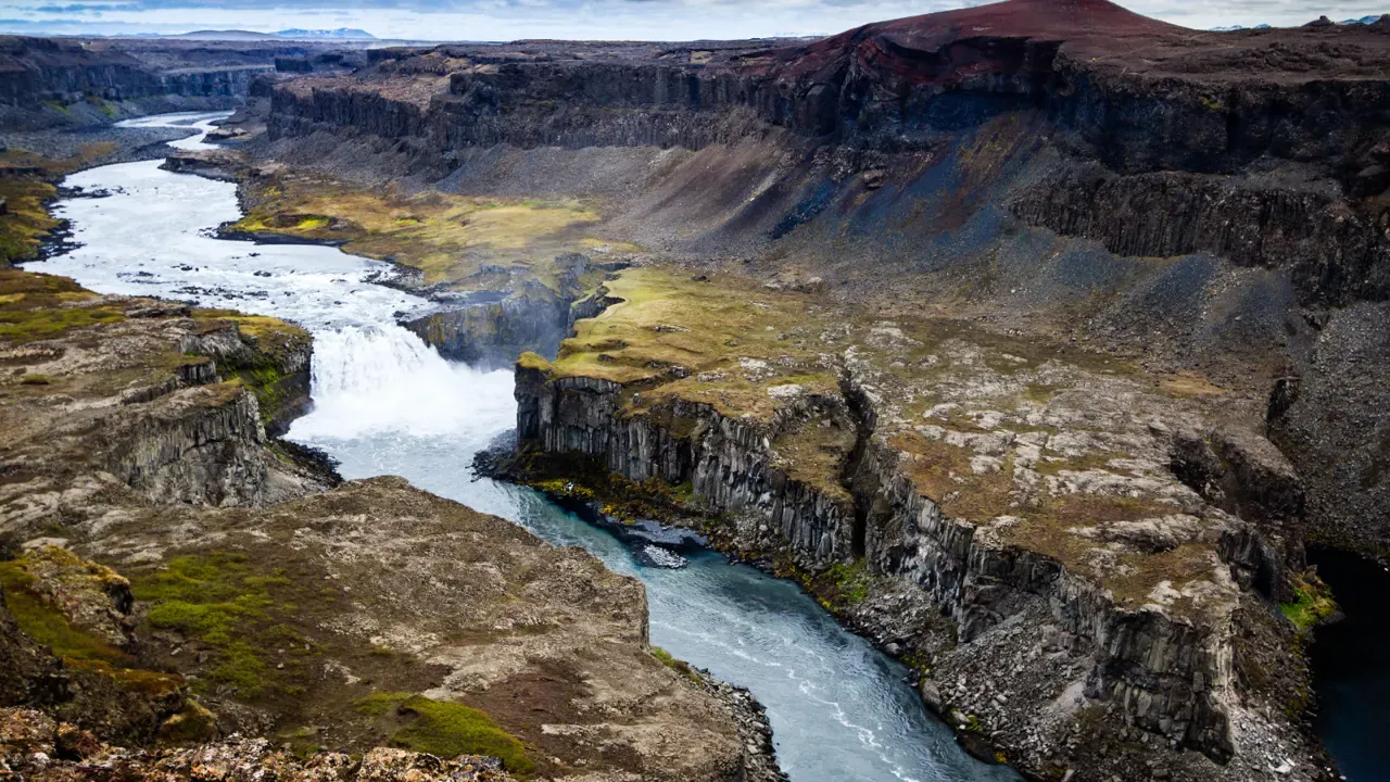 Hafragilsfoss waterfall dropping through the Jökulsárgljúfur canyon in North Iceland.