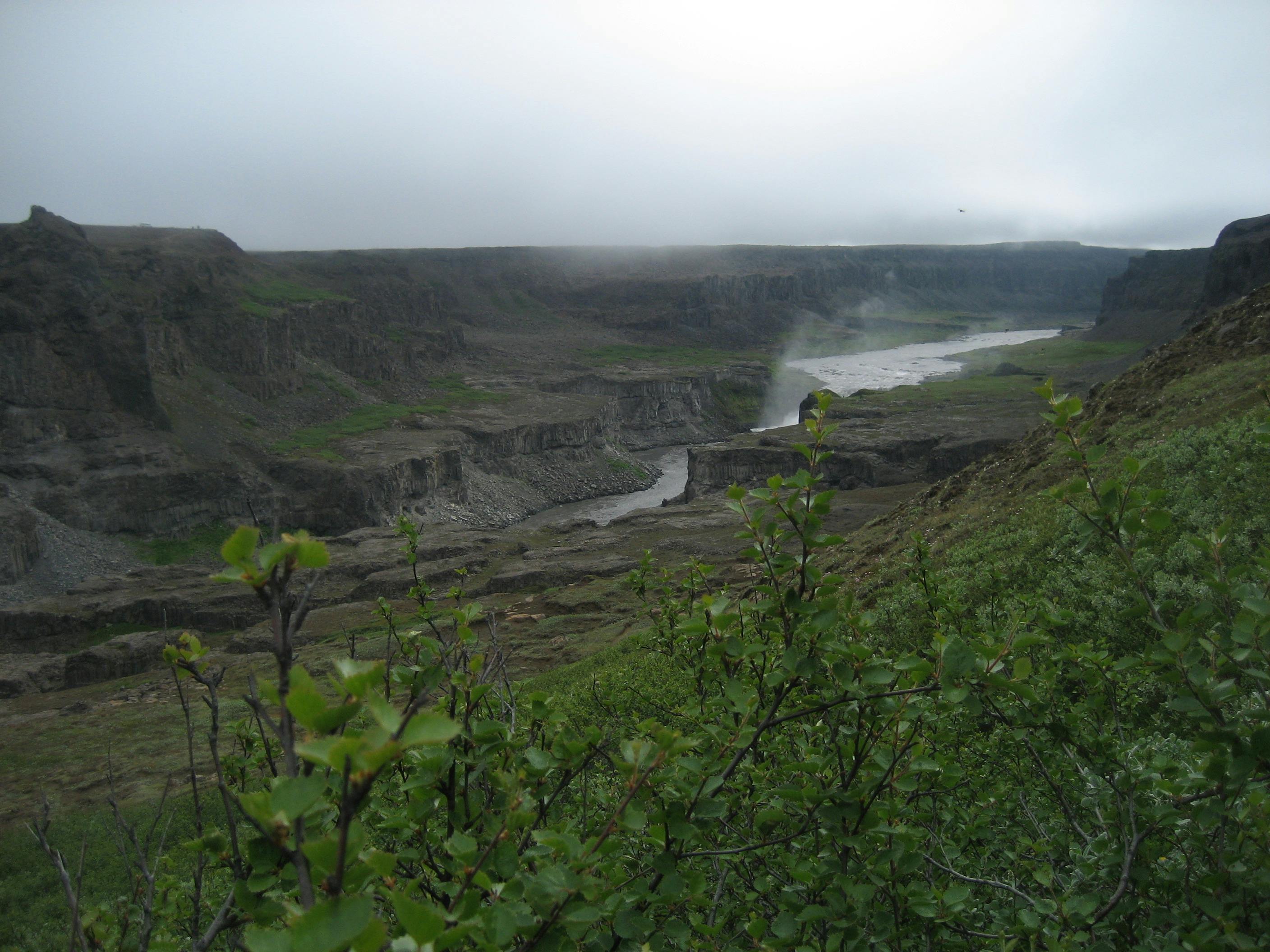 Mist and low cloud over Hafragilsfoss and the Jökulsárgljúfur canyon.