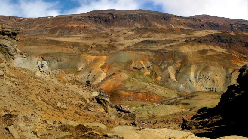 Innstidalur valley slopes and geothermal colors in the Hengladalir area.