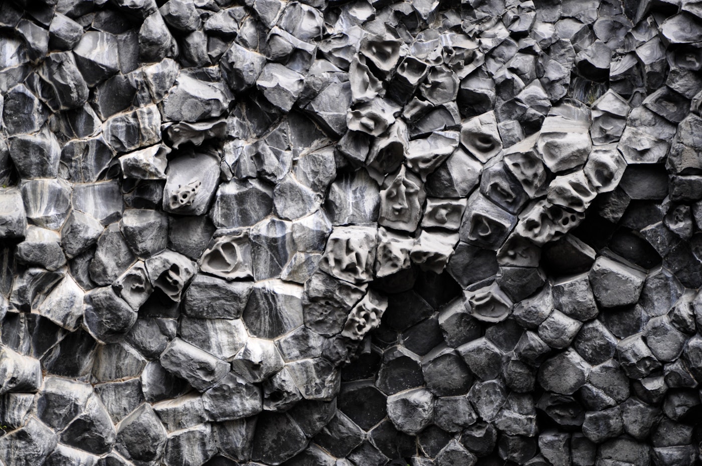 Close view of honeycomb-like basalt columns at Hljóðaklettar.
