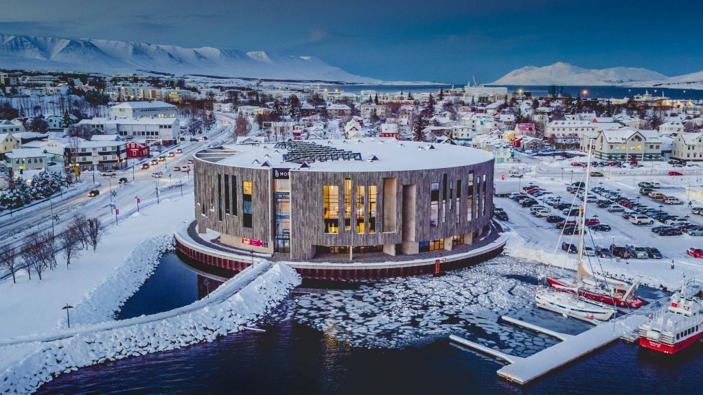Hof Cultural and Conference Centre on the Akureyri waterfront in winter.