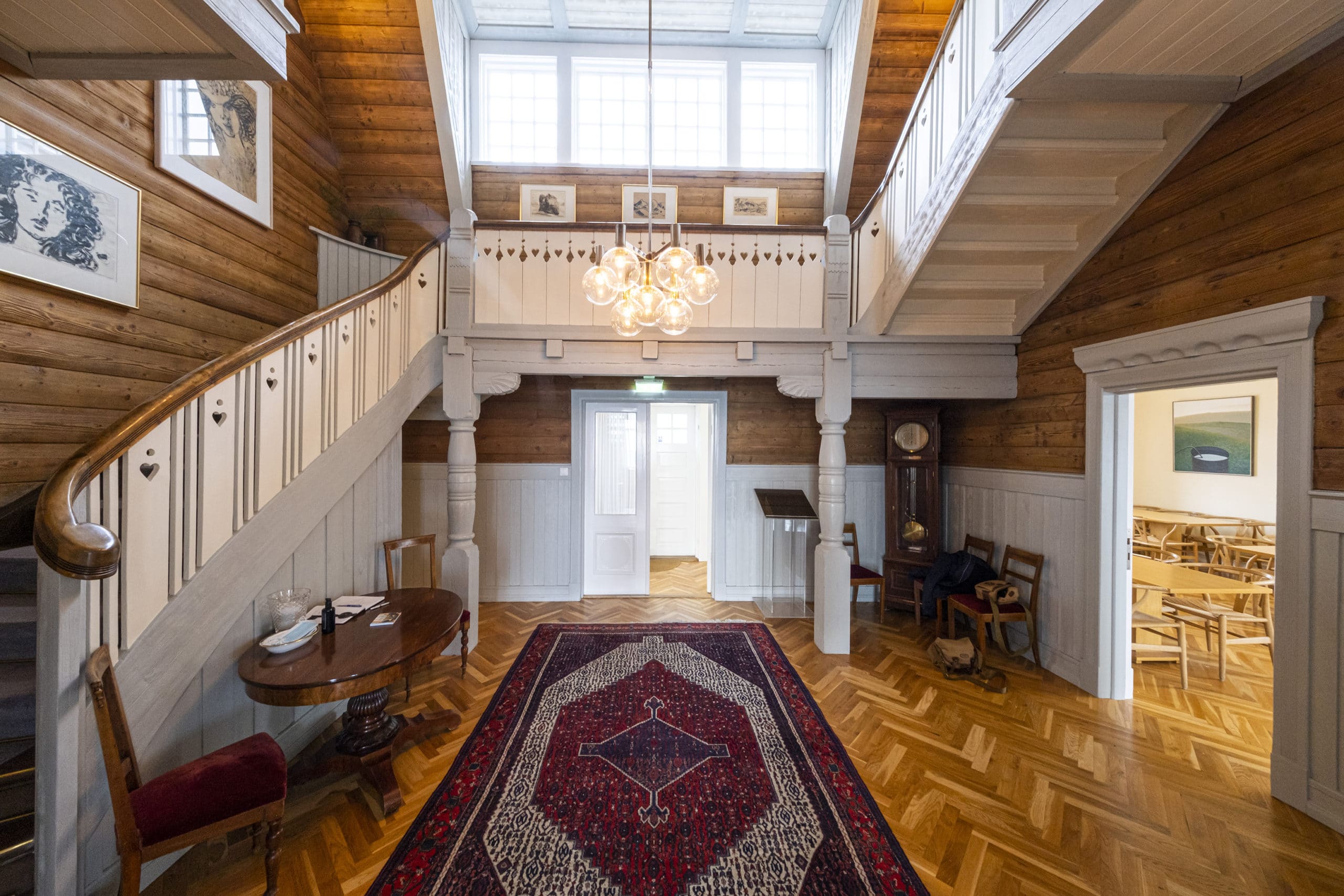 Wooden staircase and upper landing inside the historic Höfði house