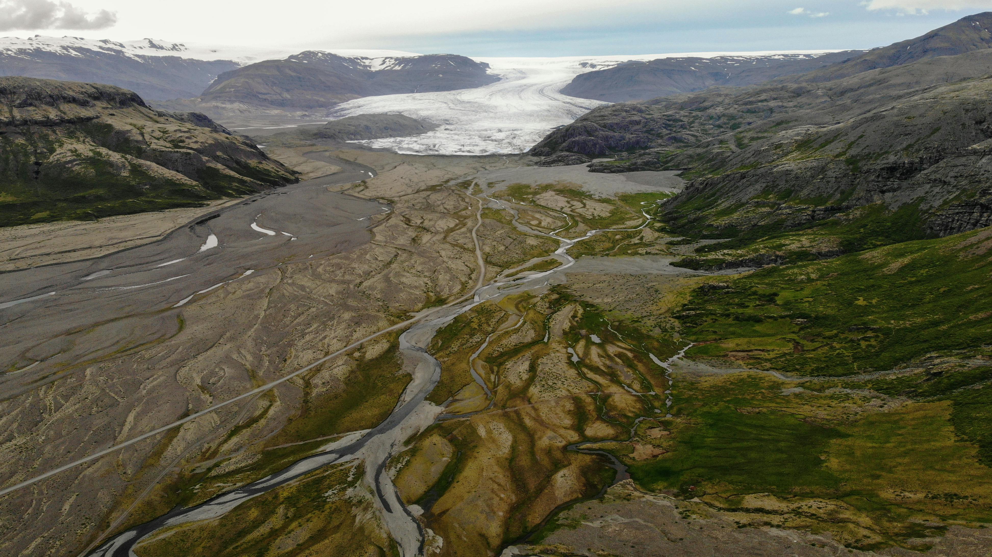 Wide view of Hoffellsjökull glacier and the surrounding Hoffell mountain terrain.