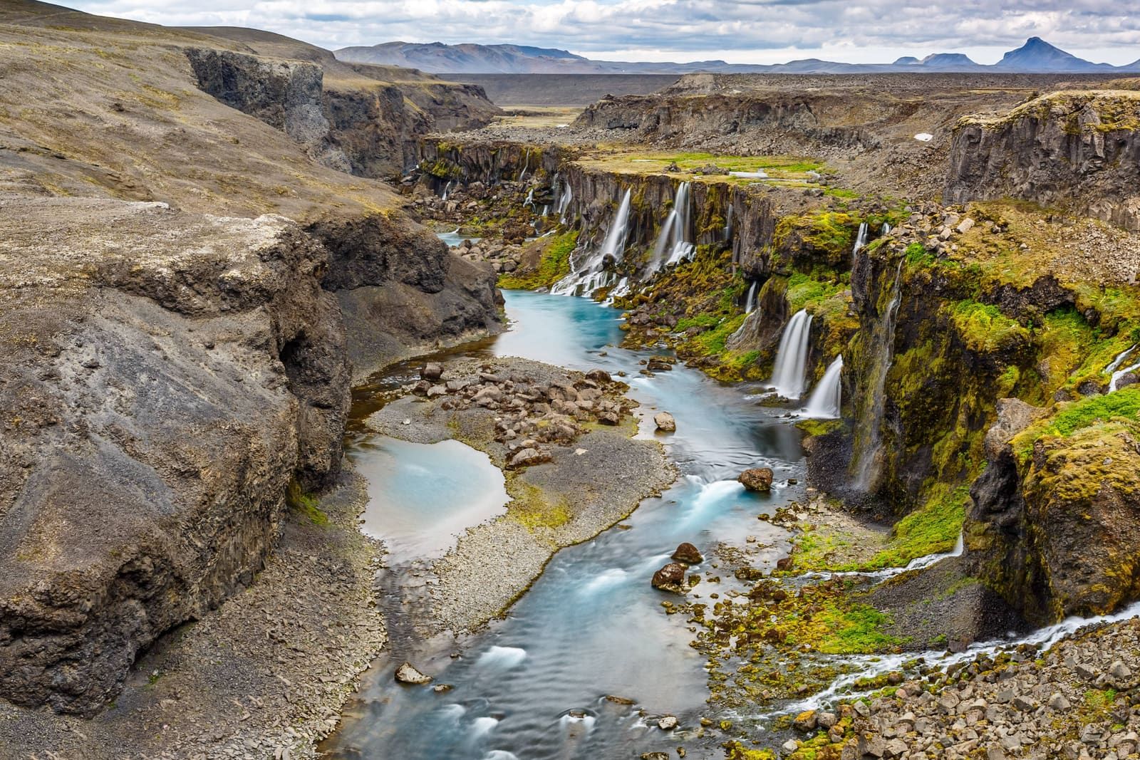 Sigöldugljúfur canyon near Hrauneyjafoss with turquoise water and small waterfalls in the Icelandic Highlands