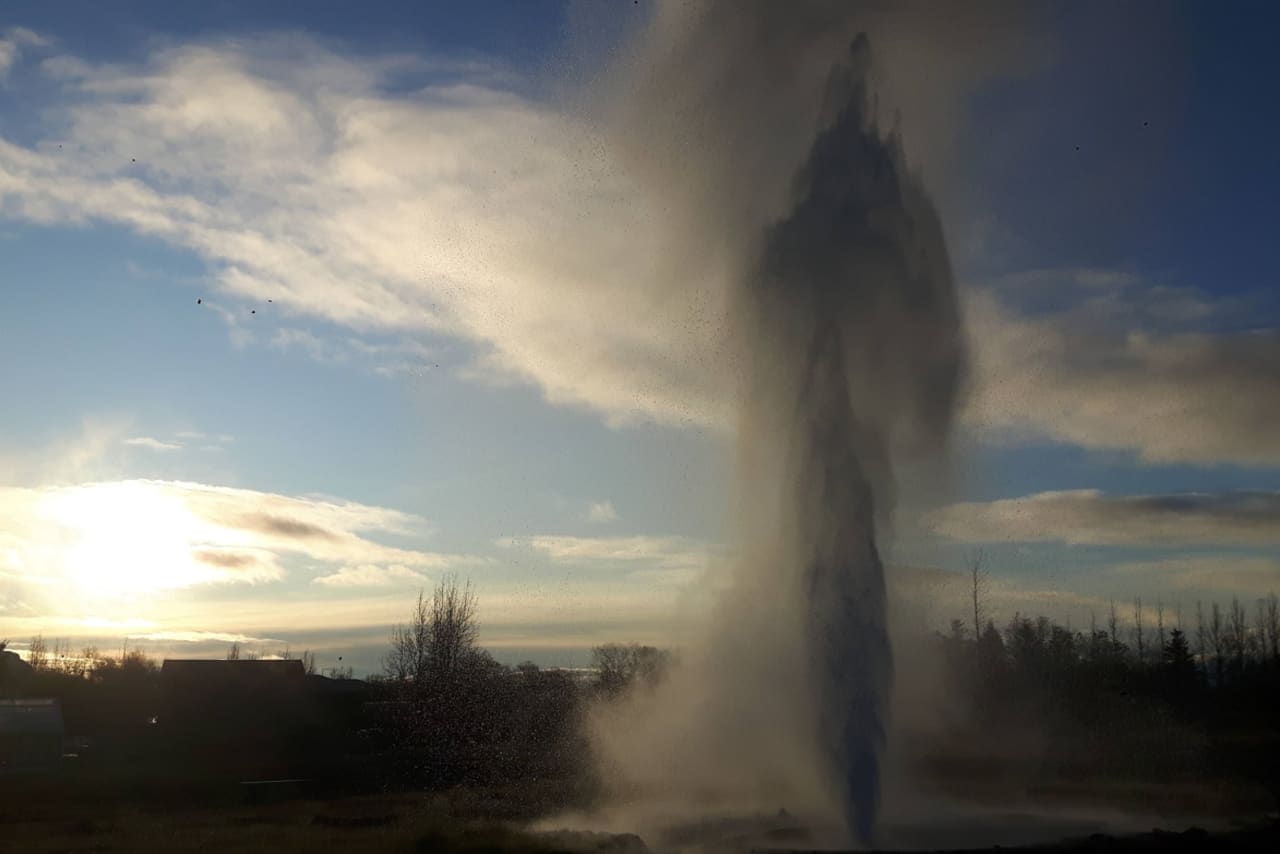 A burst of geothermal steam rising from the Geothermal Park in Hveragerði.
