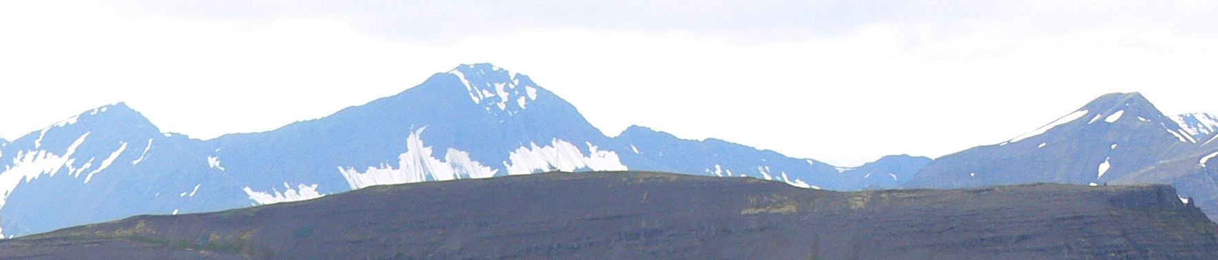 Distant Kaldbakur mountain profile above the Dýrafjörður area.