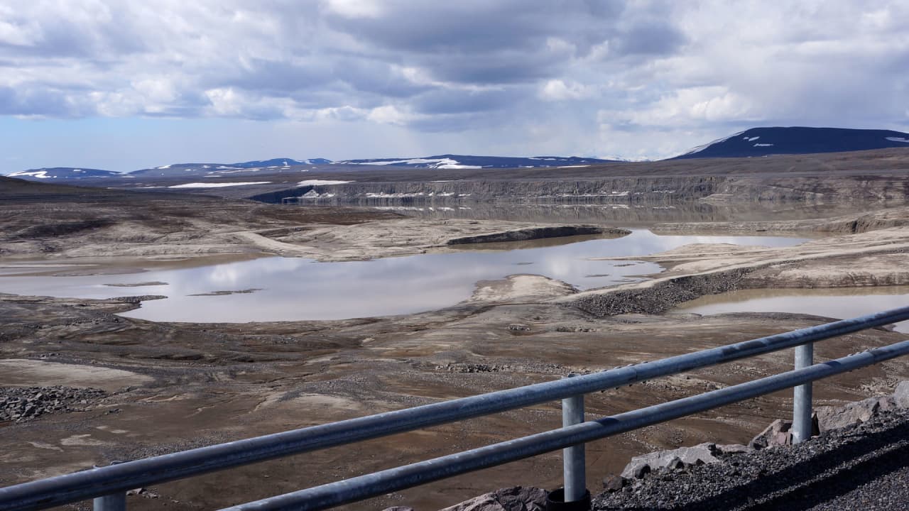 Hálslón reservoir flats and railings below Kárahnjúkavirkjun in the East Iceland highlands.