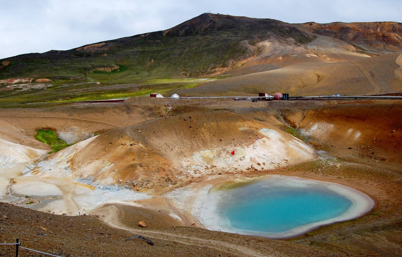 Milky blue mineral water inside Víti crater at Krafla in North Iceland.